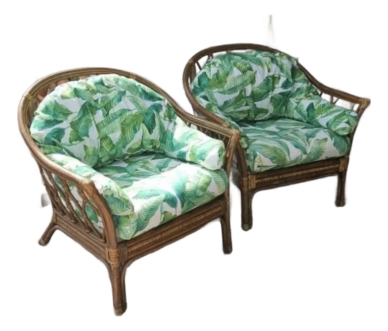 Reduced- Vintage Pair Bamboo Club Chair With Custom Upholstery: Vintage pair of bamboo lounge chairs with custom upholstery outside inside tropical banana leaves. Condition: Alterations: Original Condition Unaltered Imperfections: Some Imperfections Condition