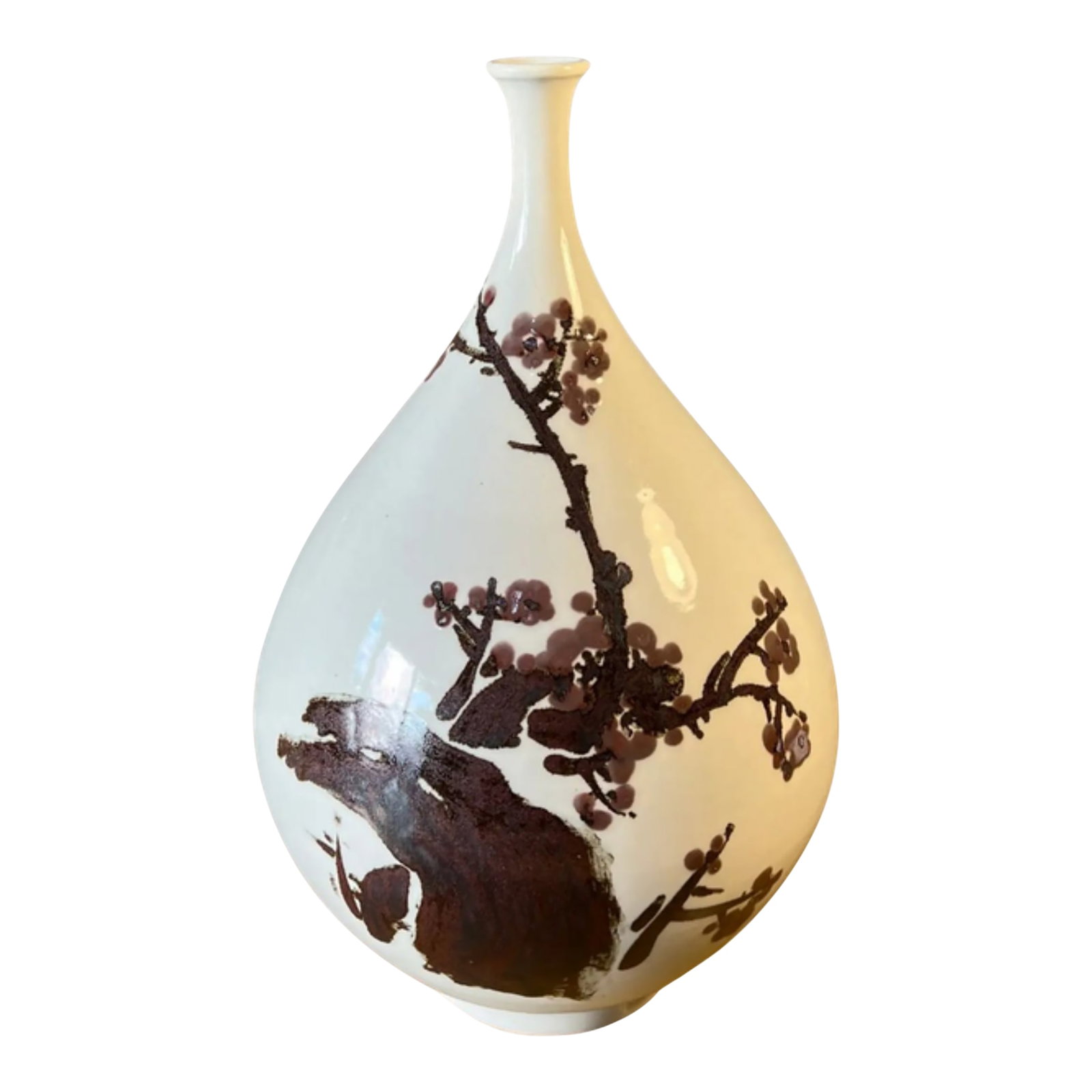 Mid-Century Asian White Pottery Bottle Vase With Brown Plum Blossoms: This large vintage white porcelain bottle vase was made in Japan, and showcases a classic East Asian aesthetic, defined by its graceful proportions and hand-painted plum blossom motif. The narrow