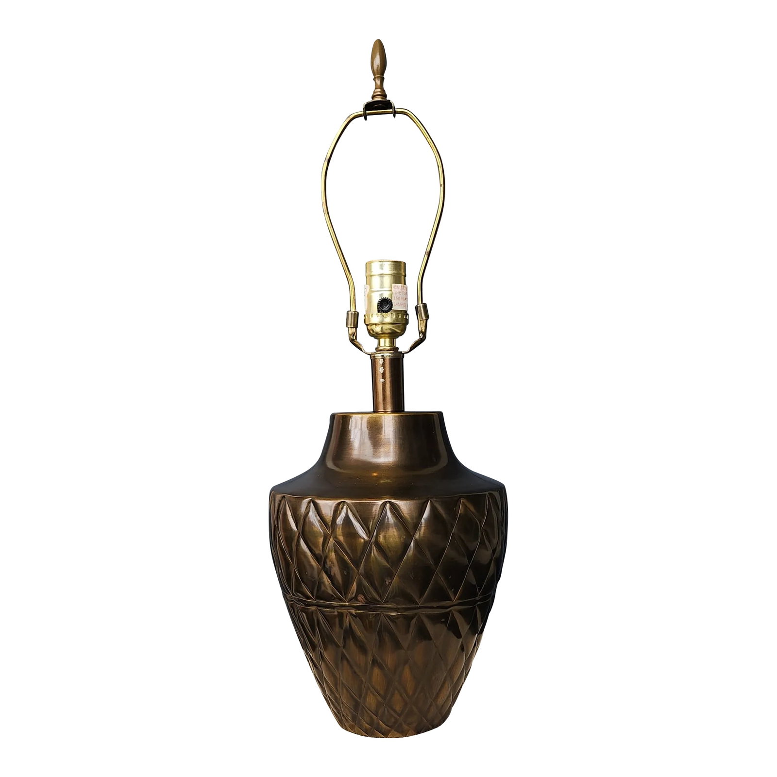 Vintage Late 20th Century Blackened Brass Tone Metal Crosshatch Lamp: Classic ginger jar shaped metal lamp with blackened metal crosshatch design. Great size for a number of uses from end table to nightstand. It measures 21 inches to the top of the finial and 14 1/2 inc