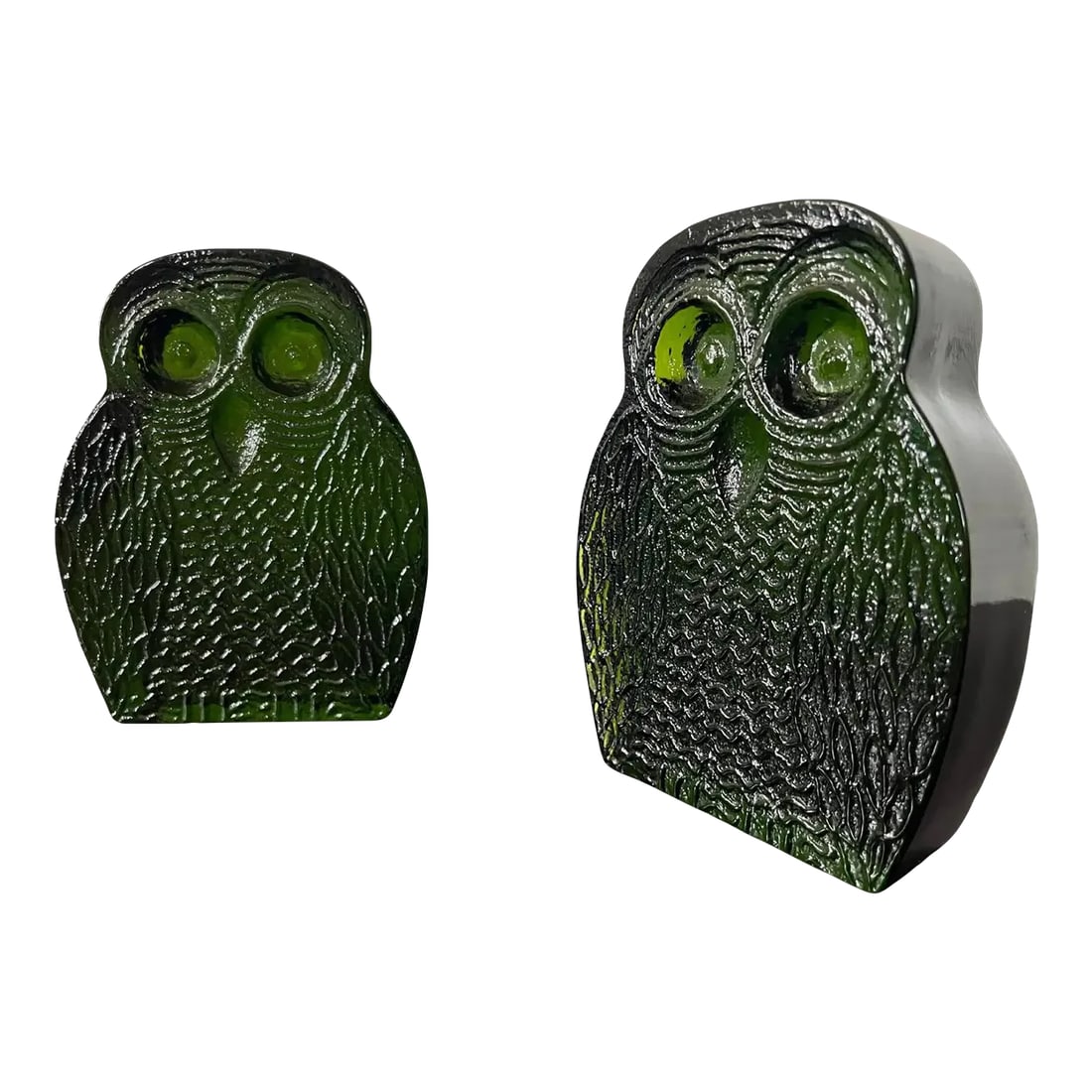 1970s Blenko Glass Owl Bookends- Set of 2: 1960s Blenko glass bookends, designed by Joel Myers rare emerald green solid cast glass with textured design in the front and smooth on the back. No labels present but well documented online.