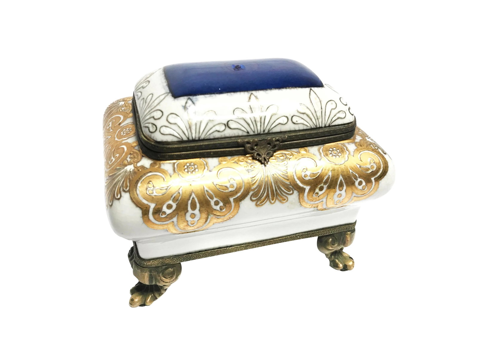 Vintage Mid Century Brass Footed Porcelain Hand Painted Jewelry Box: Vintage mid century brass footed porcelain hand painted jewelry box. The body of this opulent piece is white with hand painted 22kt gold and royal blue hand painted details and motifs. It sits on top 