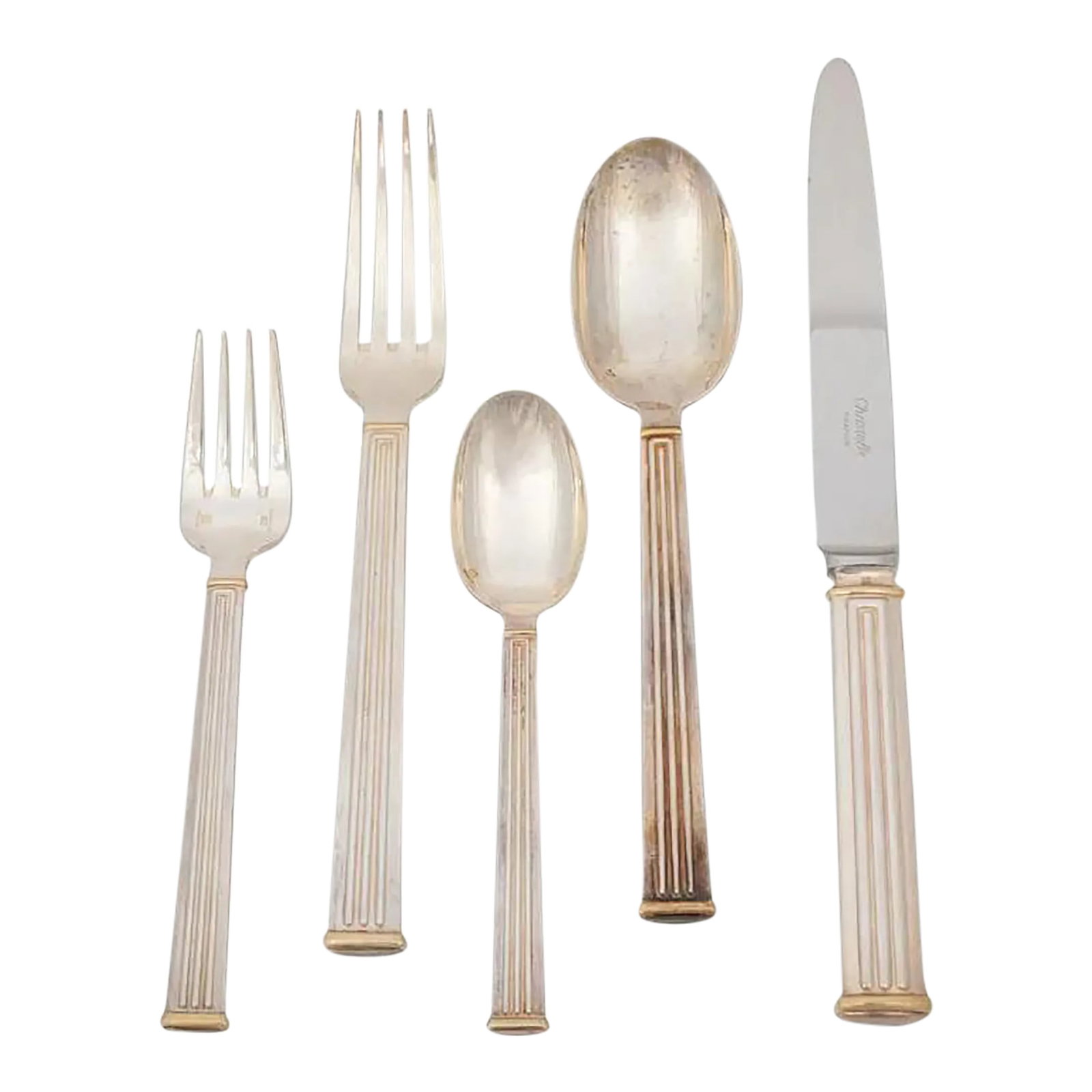 Late 20th Century Christofle Triade Gold Flatware Service for 8 - Set of 40: Triade Gold pattern, comprising: 8 dinner knives 8 dinner forks 8 salad forks 8 tablespoons 8 teaspoons Length of dinner knife is 9 7/8" Modern clean lines with a classic column motif make this patter