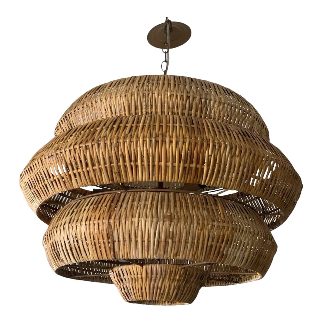 Maiz Rattan Chandelier: The Woven Chandelier is an impeccable marriage of artistry and high-quality construction. Natural rattan forms the body of this geometric chandelier, supported by a wrought iron frame that has been