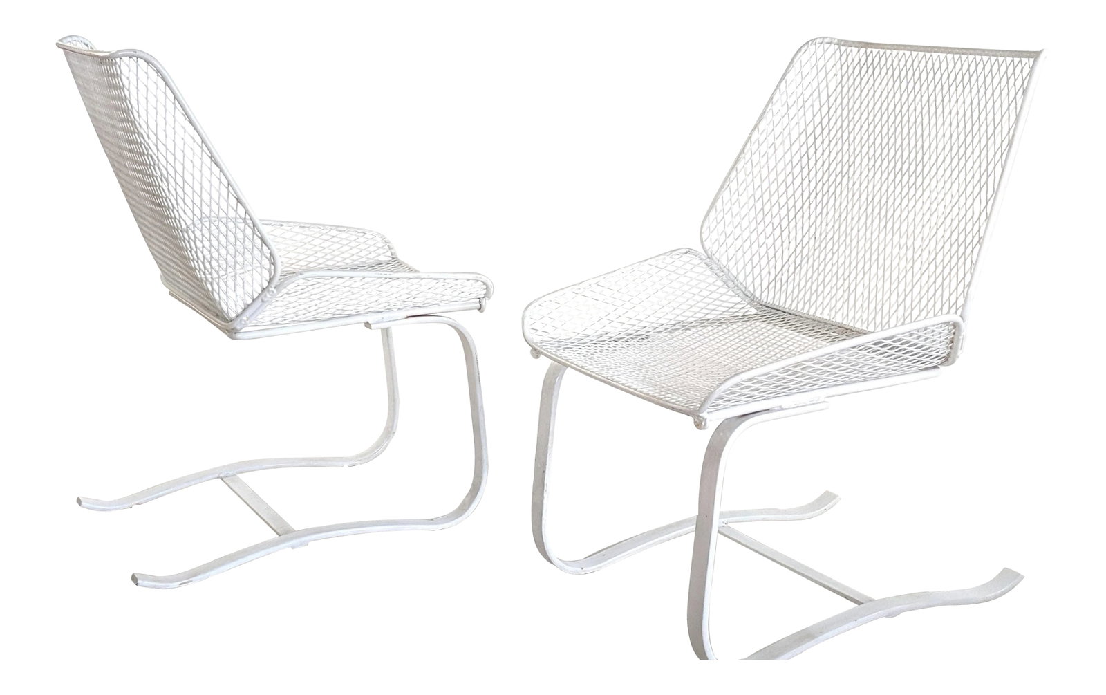 1960s Mid-Century Modern Metal Mesh Cantilever Bouncer Patio Chairs - a Pair, Attributed: Pair of vintage cantilever bouncer patio chairs. Unusual "shovel" design; In the style of Woodard or Salterini. Very comfortable. Chairs have been powder coated white. Condition: Alterations: Restored