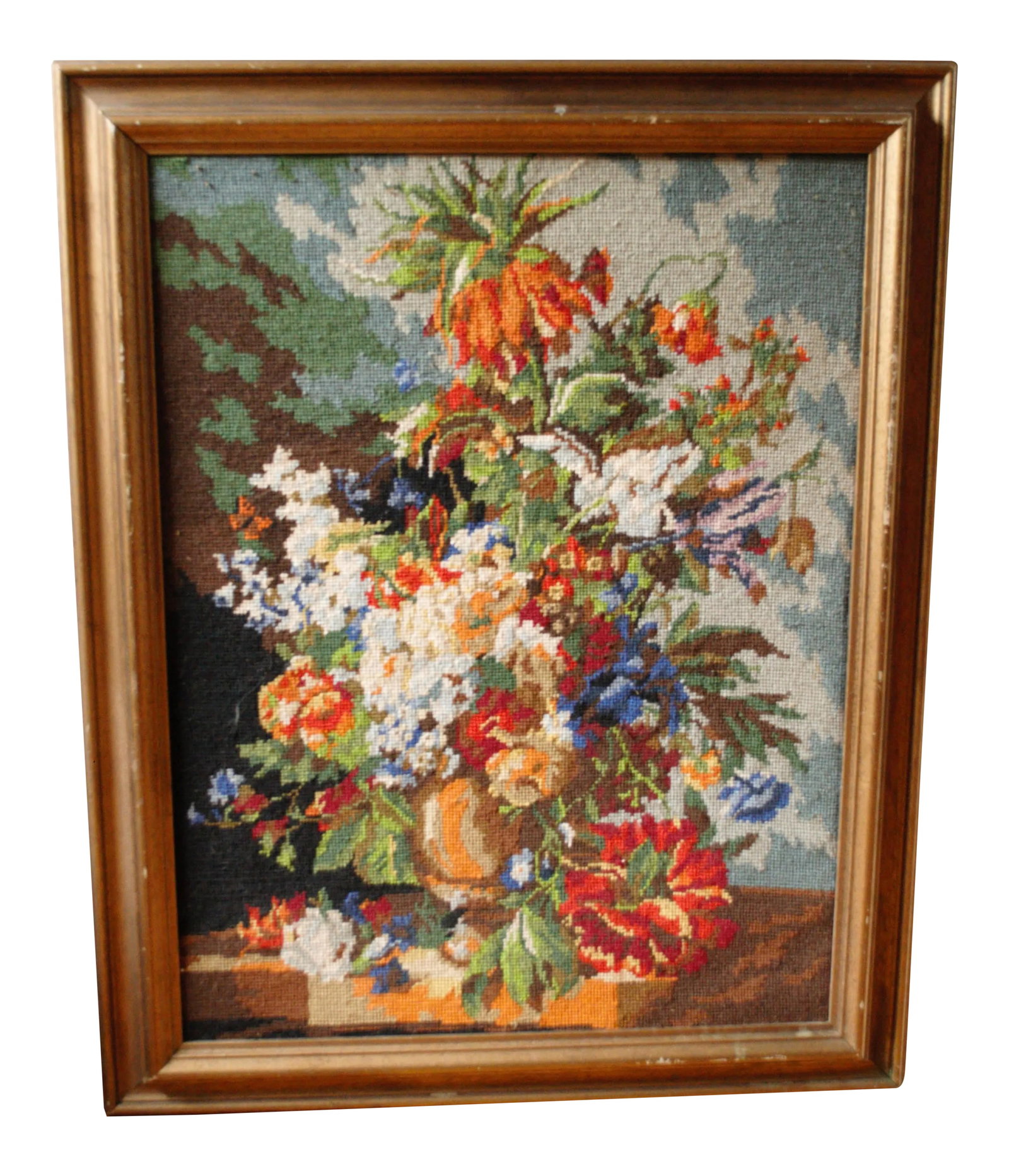 1960s Vintage Framed Needlepoint Textile Art: Vintage wool needlepoint in its original frame. A traditional floral still life beautifully done in a mutil colored pallet. The frame is 3". Condition: Alterations: Original Condition Unaltered Imperf