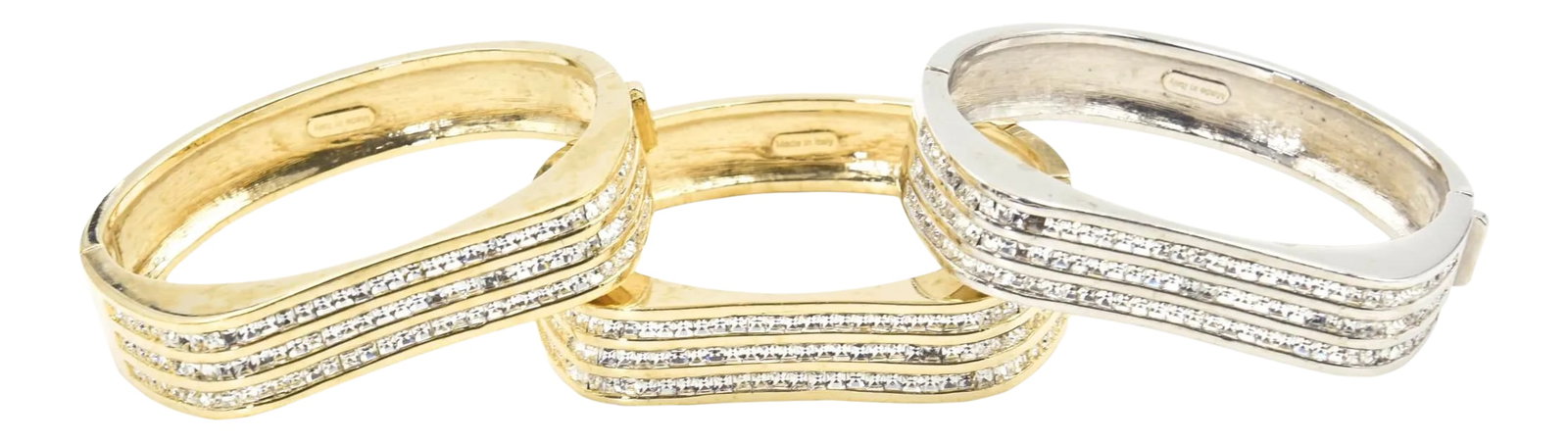 Italian Stackable Crystal Wave Bangles Bracelets Set of 3: Beautifully made Italian bangle bracelets featuring three rows of crystals across the front of each bracelet. The front section has a wave design. One bracelet looks like white gold and the other two