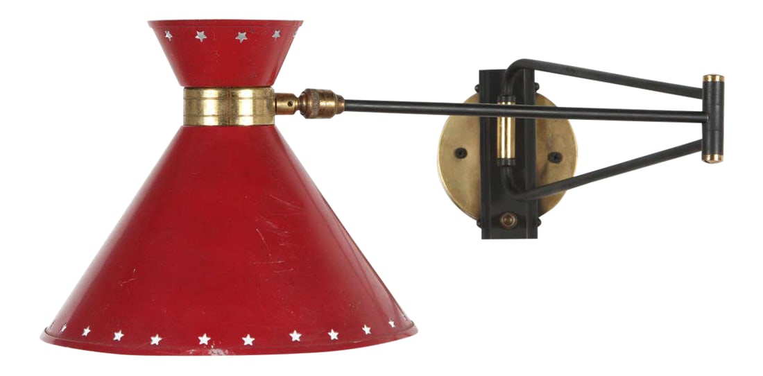 1960s Red Articulated Sconce by Rene Mathieu: Articulated sconce in the style of Stilnovo. Red enamel shade has star cut-out detail on either side. Condition: Alterations: Original Condition Unaltered Imperfections: Some Imperfections Condition