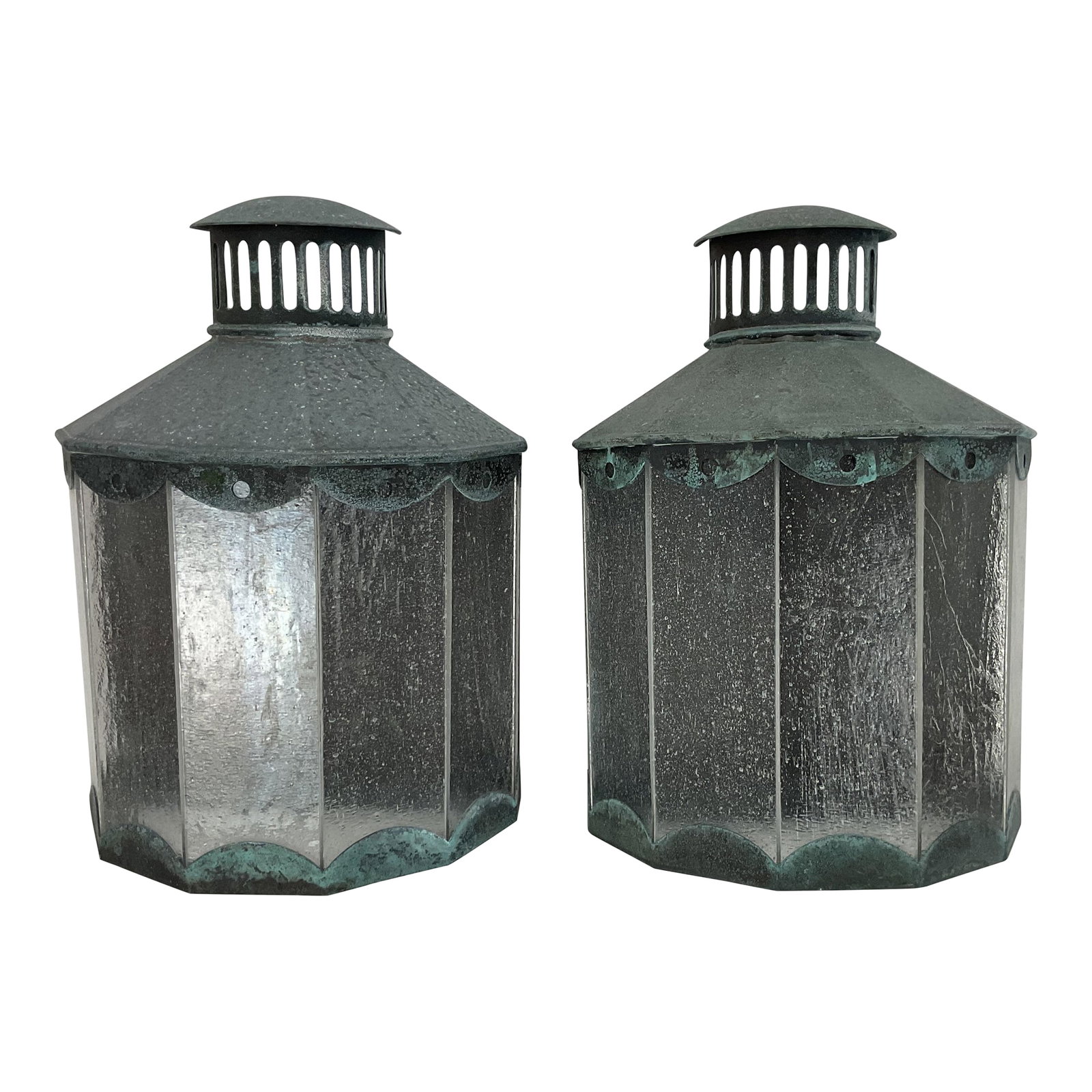 Pair of Solid Brass Outdoor Lanterns by Phoenix Day Co.: An elegant pair of solid brass wall lanterns by Phoenix Day Co., beautifully crafted with timeless quality and durability. Each lantern features a classic hexagonal form with finely patinated brass fr