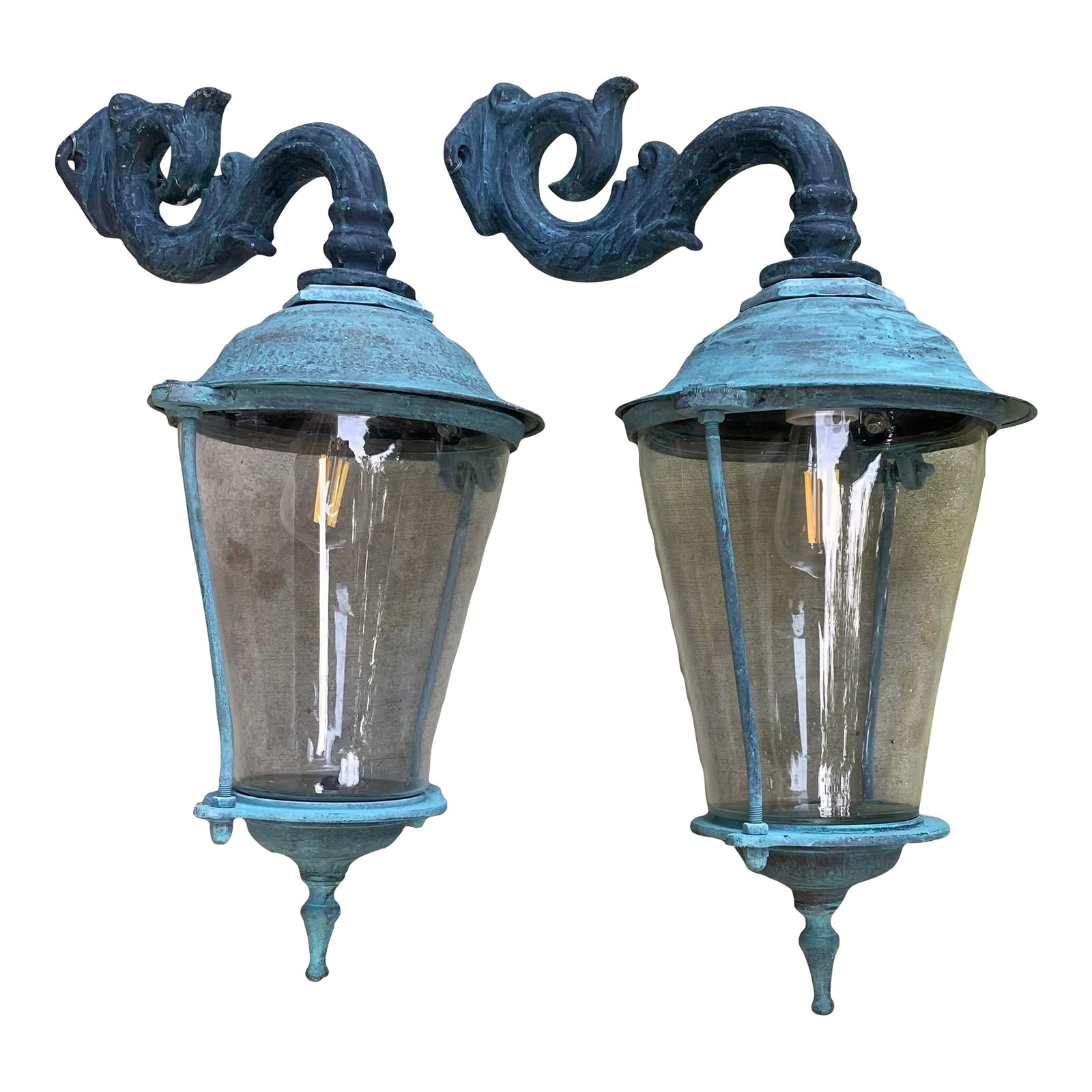 Pair of Antique Brass Wall Lanterns /Sconces - 17" Deep X 10".5 Wide X 25" High: Illuminate your home with the timeless elegance of this exceptional pair of antique brass wall lanterns. These captivating vintage fixtures offer a glimpse into a bygone era, showcasing exquisite