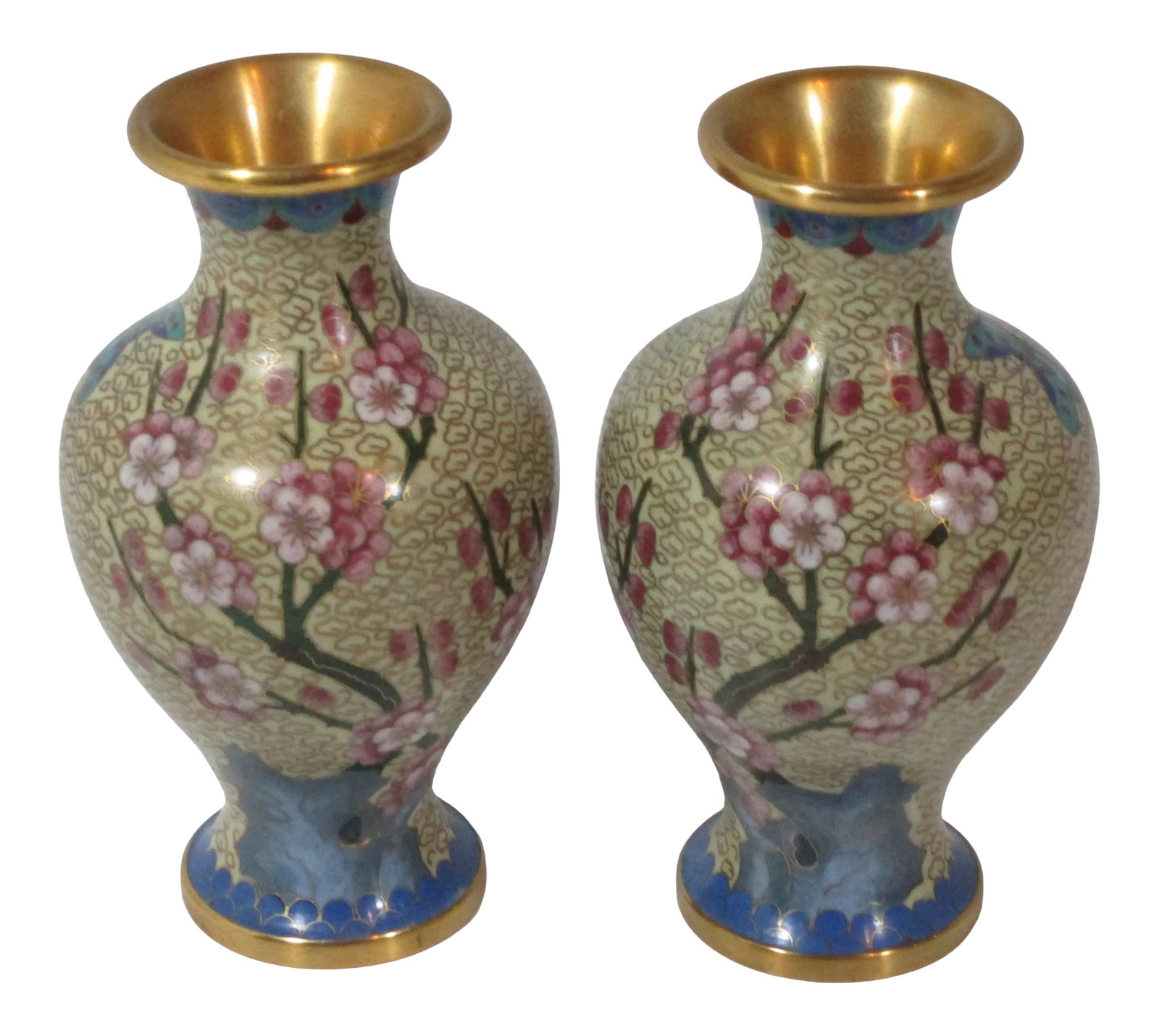 1960s Chinese Floral Cloisonne Vases - a Pair: A wonderful pair of vintage Chinese cloisonne vases. They are made of brass with a decorative overlay enamel design of cherry blossoms and butterflies in colors of rose, blue and black on a tan