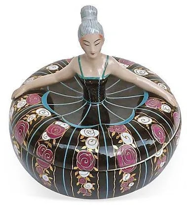 Robj Art Deco Ballerina Bonbonniere: This porcelain ballerina lidded bonbonniere box features a French, Art Deco style ballerina head and torso as the handle on the lid and her floral dress as the box. This vintage piece was made