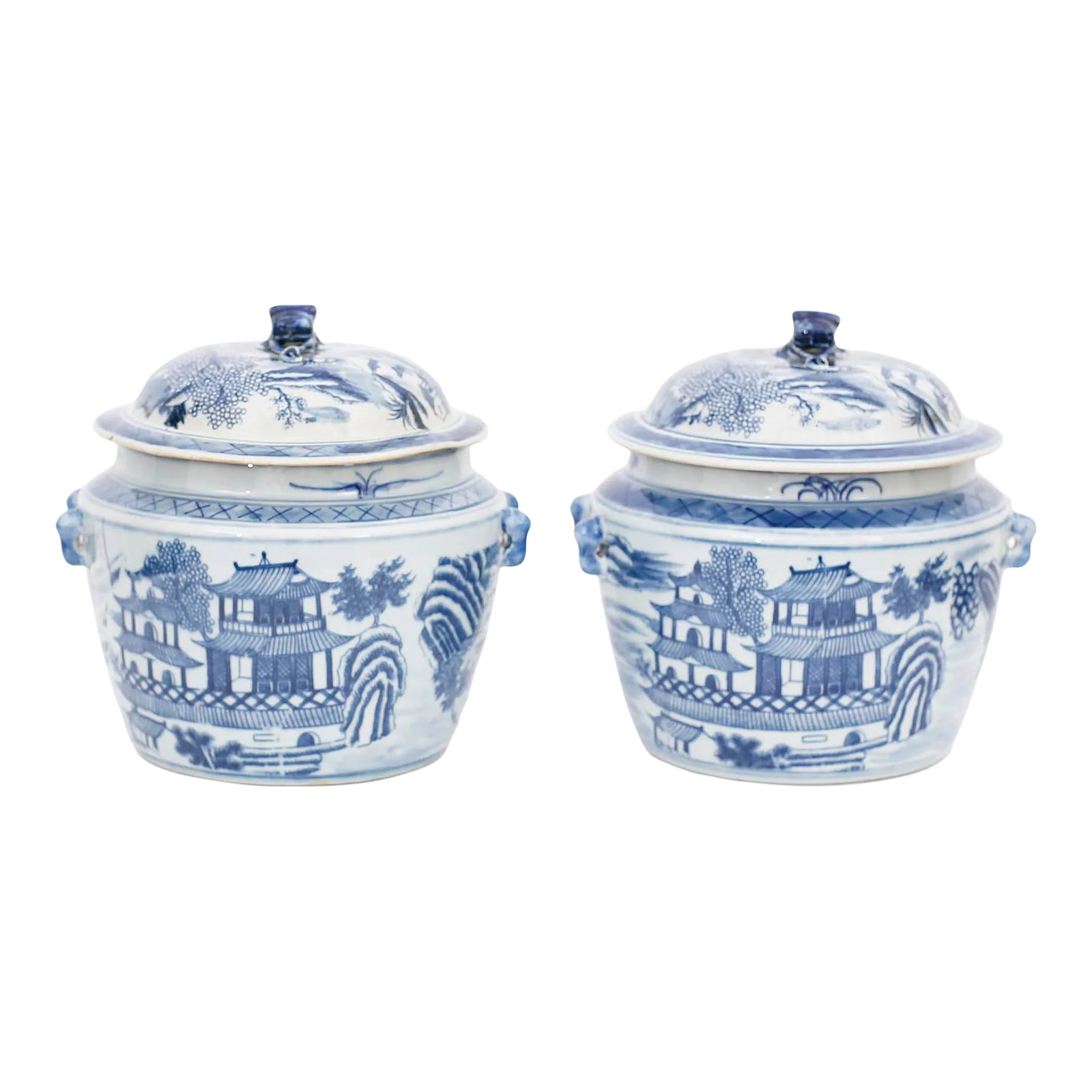 Pair of Blue and White Porcelain Pots With Pagodas`: Pair of Chinese blue and white porcelain lidded pots with cat handles, hand decorated all around with pagoda motifs on the front and back. Condition: Alterations: Restored Imperfections: Some Imperfec