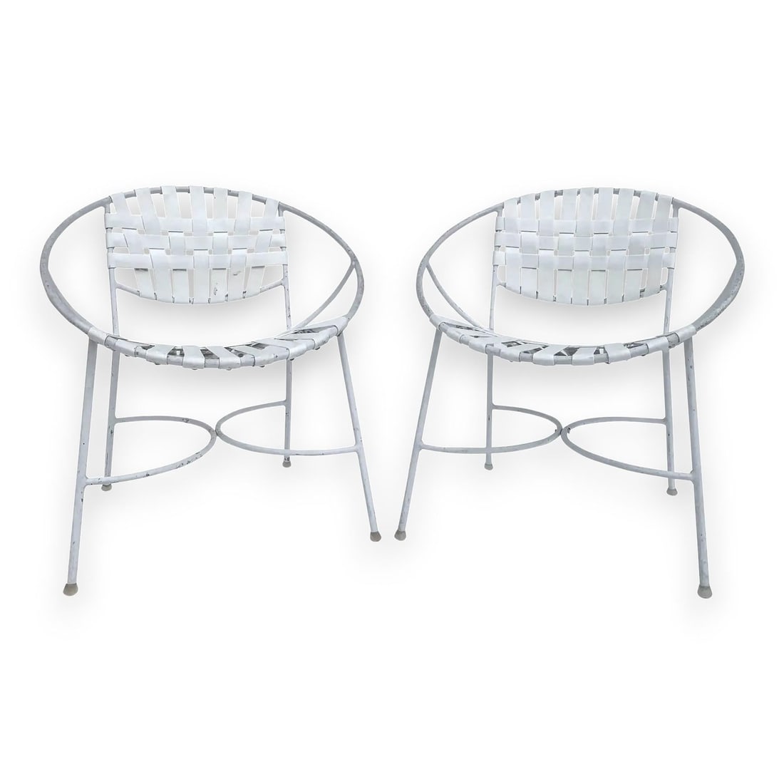 1960s Mid-Century Modern Wrought Iron Patio Radar Chairs - a Pair: Beautiful 1960s Mid-Century Modern wrought iron patio radar chairs. This pair have amazing wrought iron frames, with nylon strapping. All original, unaltered condition. Easy to completely restore, or 