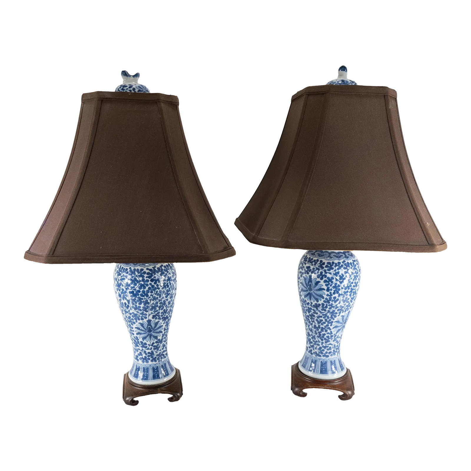 Chinese Chinoiserie Pair of Blue and White Table Lamps: We are selling this great decorative pair of Chinoiserie lamps. These Chinese blue and white lamps are mid 20th century copies of earlier garniture vases that would have been made in the 18th century