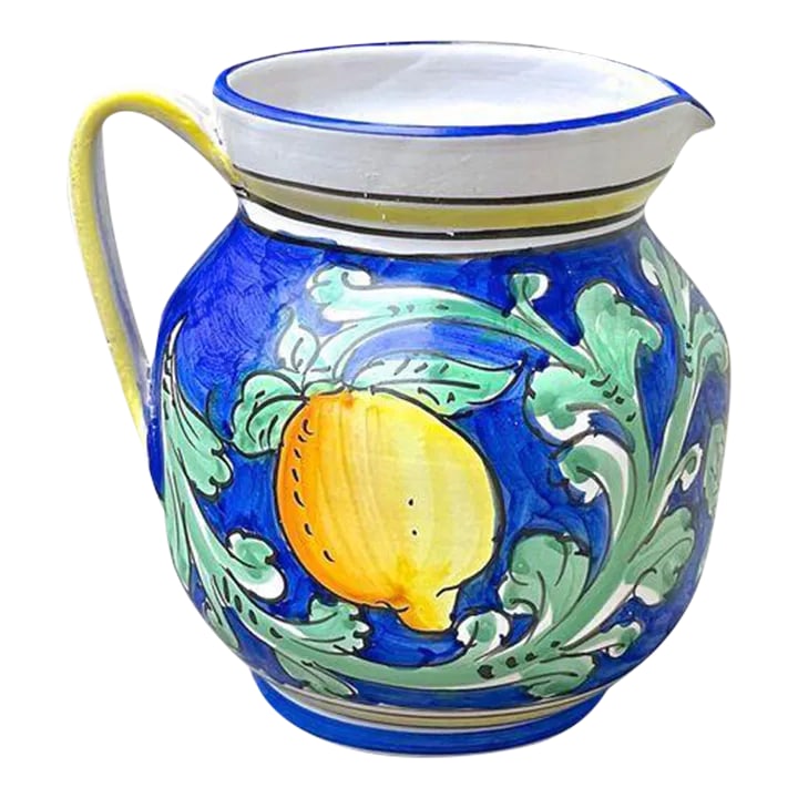 Vintage Italian Lemon & Acanthus Leaf Pitcher: Vintage Italian Deruta style lemon and acanthus leaf pitcher with handle. Hand-painted lemon and acanthus leaf decoration. Marked: "Pipio Toriivia, Made In Italy, For Fortunata, For Decorative Use
