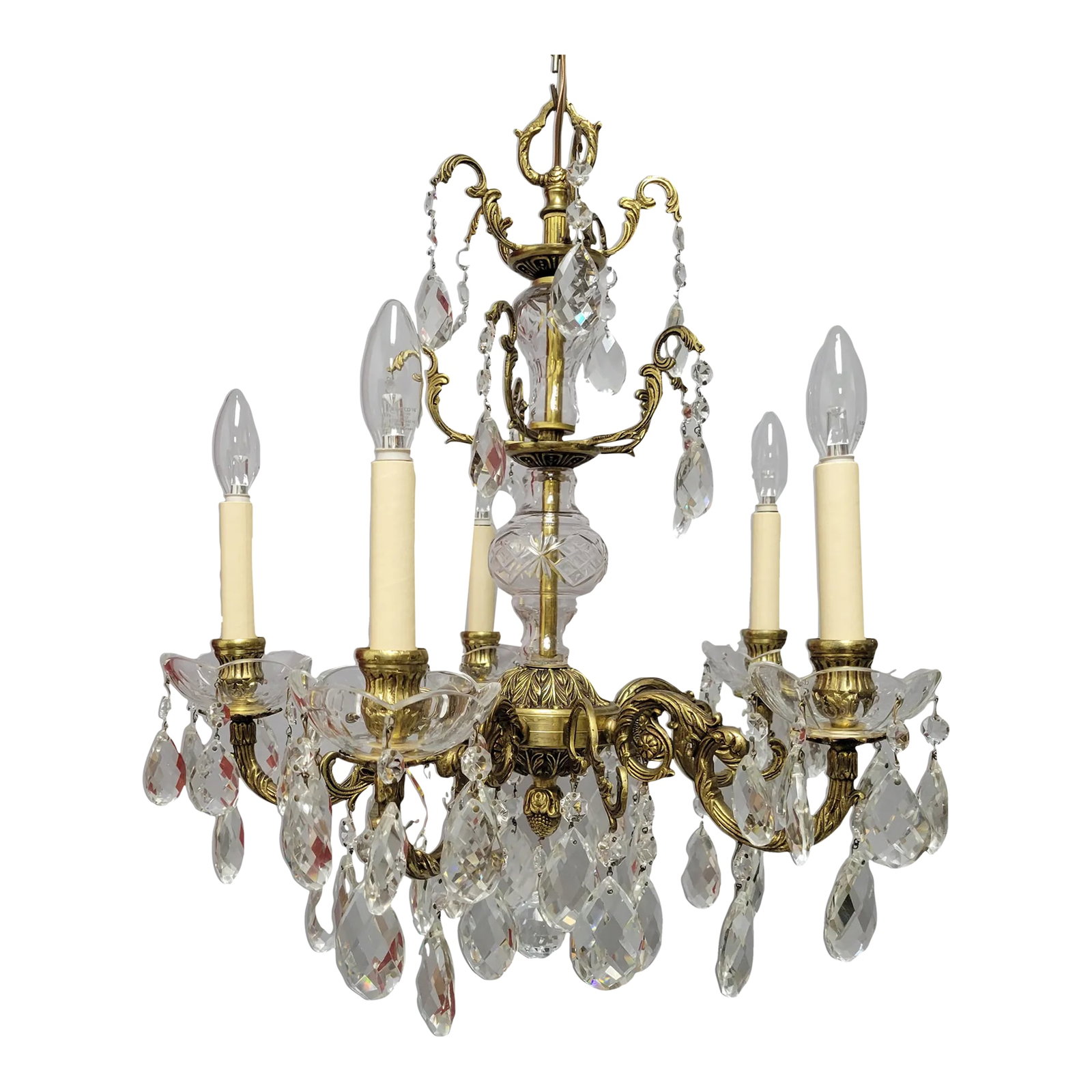 Mid 20th Century Cast Brass & Crystal Chandelier: Cast brass & crystal traditional chandelier with lovely details. Versatile size can be used in a small foyer, bedroom or powder room. It is in wonderful condition and has been professionally cleaned a