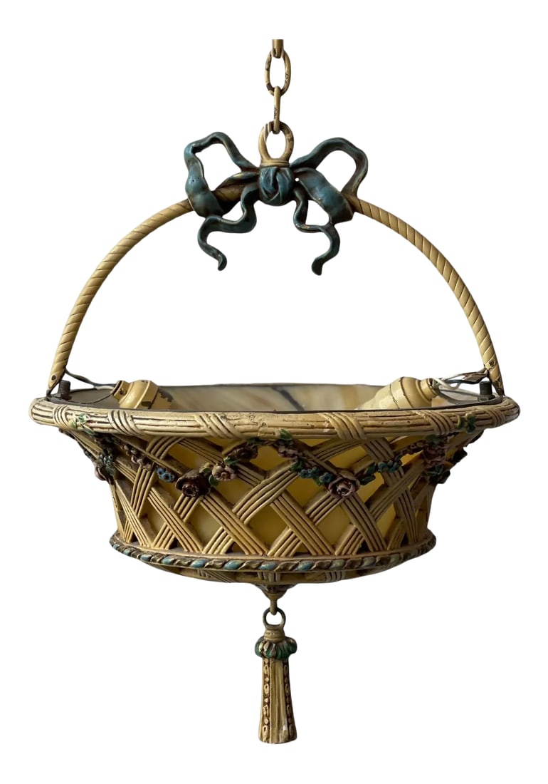 Vintage 1920s Floral Basket Chandelier With Caramel Slag Glass: Offered for sale is a darling and so unusual floral basket chandelier. The inside lights illuminate a warm glow with the slag glass lining. A blue bow handle and Tassel finial add a charming detail