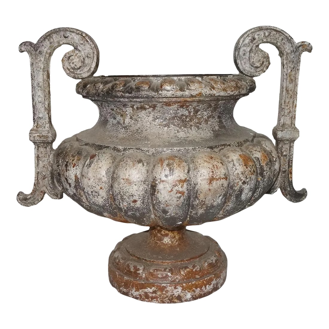 Antique French Cast Iron Garden Urn With Scrolled Arms: Antique French cast iron garden urn having gadrooned body and elegant scrolled arms. Surface has a lovely weathered patina. The inside has been painted black, the outside has been clear coated. The ba