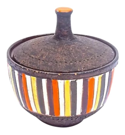 Mid-Century Modern Bitossi Striped Dish: Vintage; 1960s, Mid-Century Modern, Bitossi for Raymor, striped, lidded dish. Sloped and tapered lid with orange glaze accent at top. Body has striped orange, yellow, and white glazing with brown