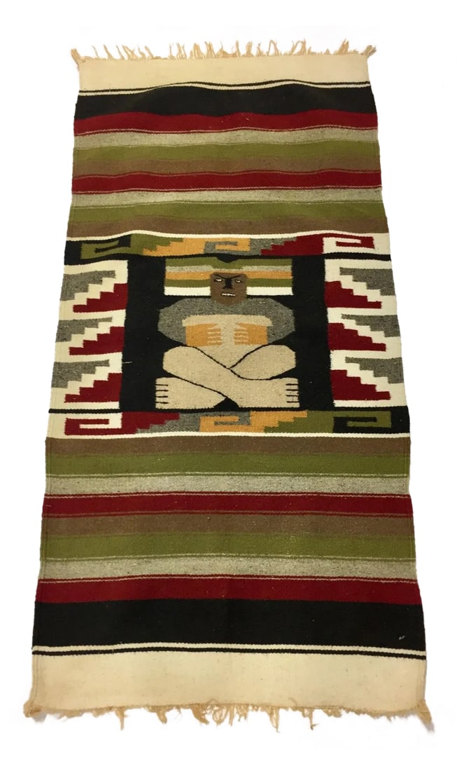 Vintage Mexican Tapestry: Vintage Mexican multi colored weaving or sarape with geometric designs and Mexican figure in the middle possibly Mayan or Aztec circa 1940s - 50s. Condition: Condition Notes: Excellent - Minor wear