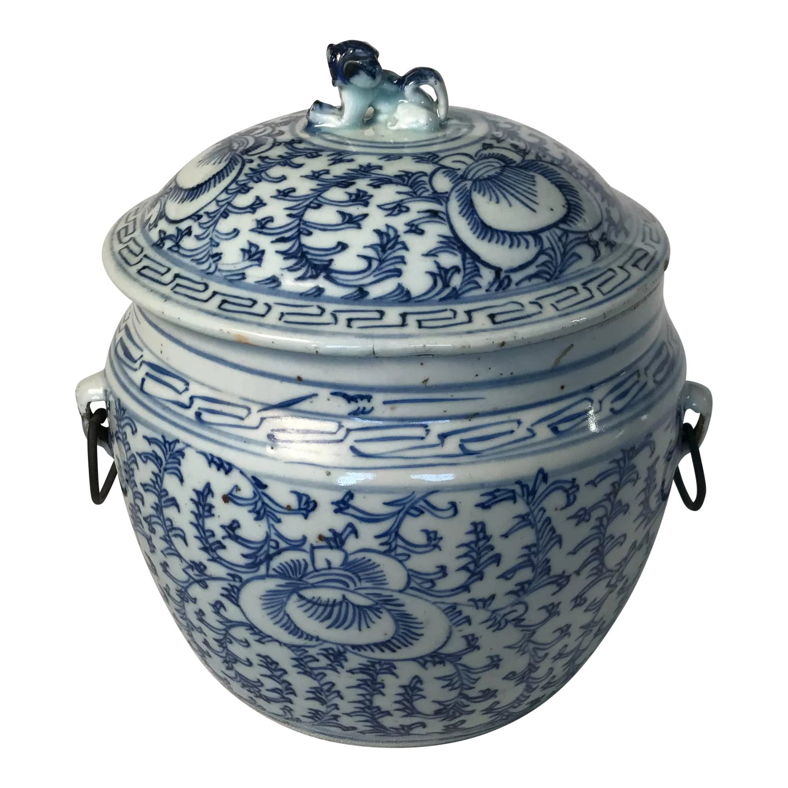 Tongzhi Era C.1870 Foliate Decoration Covered Porcelain Ginger Jar, Iron Handles on the Sides and Fo: Tongzhi Era, circa 1870 having foliate decoration covered porcelain ginger jar. Iron handles on the sides and a foo dog ceramic handle on the lid. About 9" tall and about 7" diameter. Restorations, ha