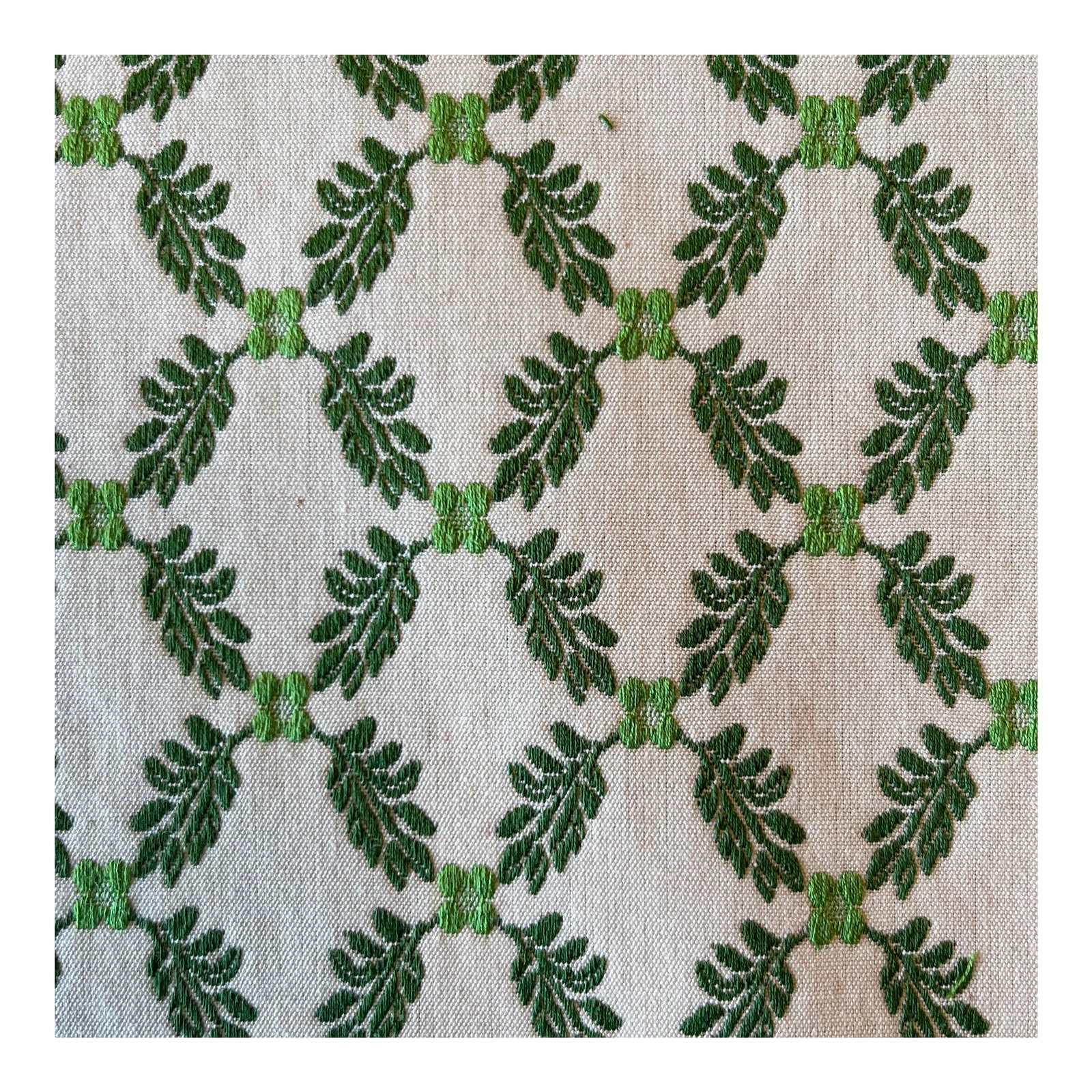 Green Cotton Upholstery Fabric- 2.5 Yards: Cotton Upholstery fabric. Good quality, was used for Pillows. Has a green geometric pattern with leaves/branches and flowers on an off white background. The pattern is raised. 2.5 Yards Condition: Alt