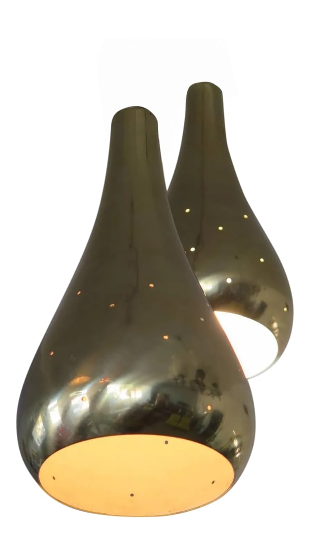 Tynell Style Pendant Lamps - A Pair: A pair of Paavo Tynell style pendant lamps. Polished brass, with perforations. Hourglass shape. Condition: Alterations: Original Condition Unaltered Imperfections: Some Imperfections Condition Notes: