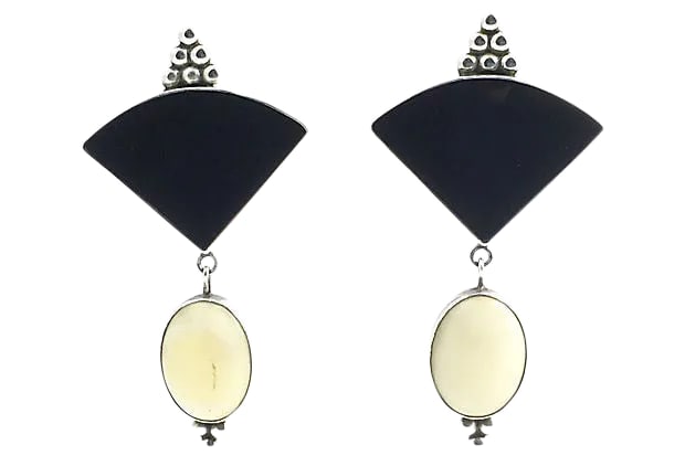 Bone & Onyx Sterling Earrings by Pueblo Artist Sam Lovato: Vintage handcrafted sterling silver clip-back earrings featuring beaded detailing, bezel-set bone cabochons, and onyx triangle pieces made by Santo Domingo Pueblo artist Sam Lovato (1935-1999).