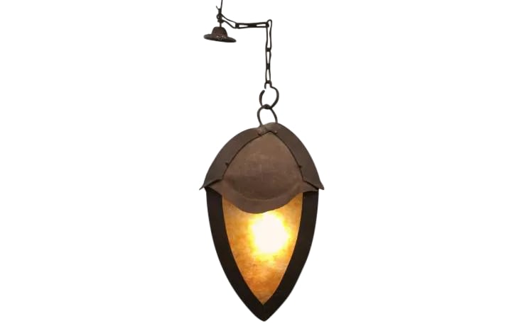 1940s Arts and Crafts Gothic Wrought Iron Lantern: Great Arts and Craft wrought iron lantern. This lantern is in the shape of a large Acorn. Its hand crafted and has Mica that is laminated to help protect it. The light fixture is 30" tall and has abou