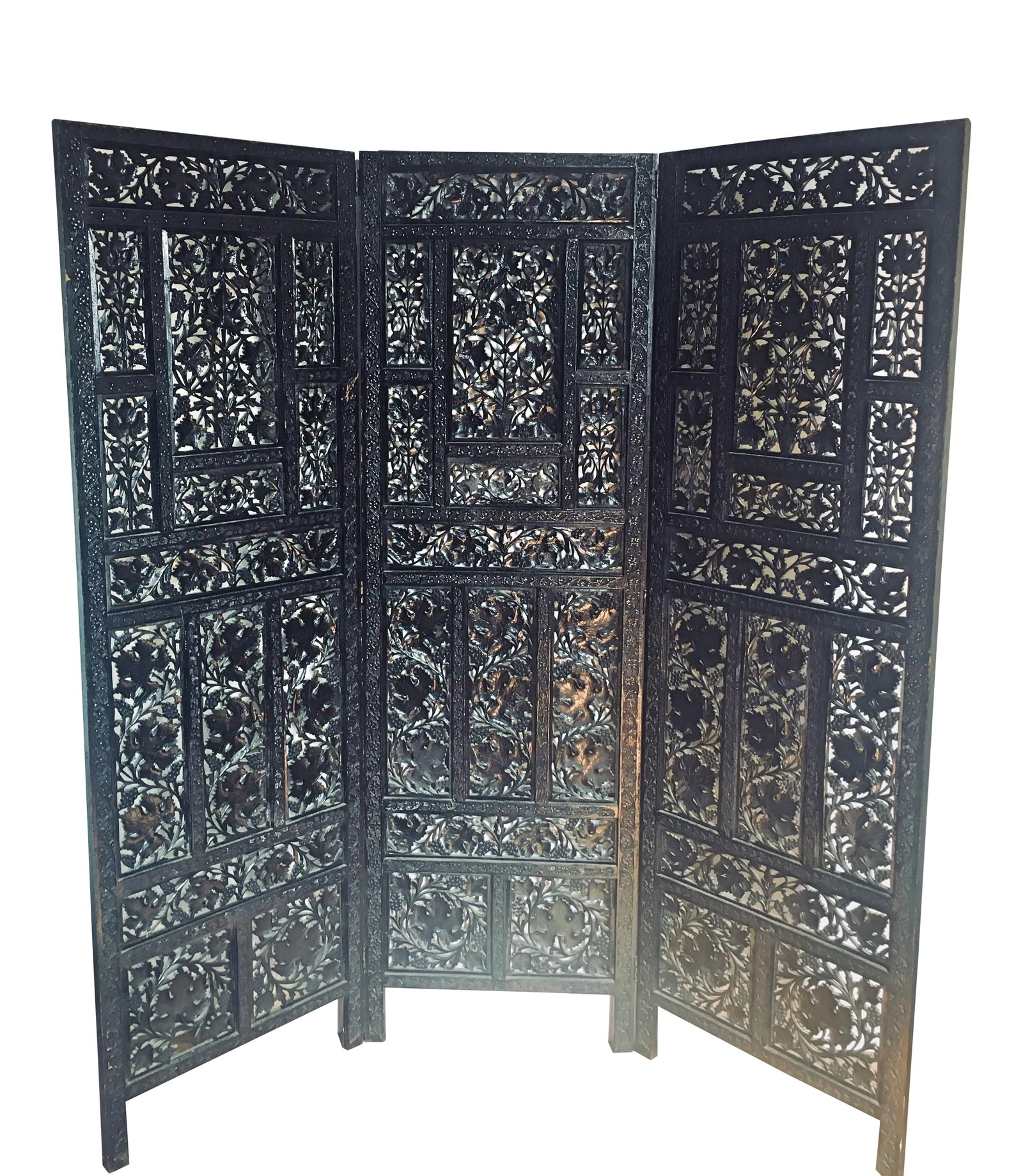 Aesthetic Movement Style Ebonized Tri-Panel Folding Screen: Heavily carved and ebonized three-panel folding screen with intricately carved grape and leaf motif. Each panel measures 20.125" Dimensions: 52.25 x 14.75 x 67.25 (open as shown) 60.5 x .825 x 67.25