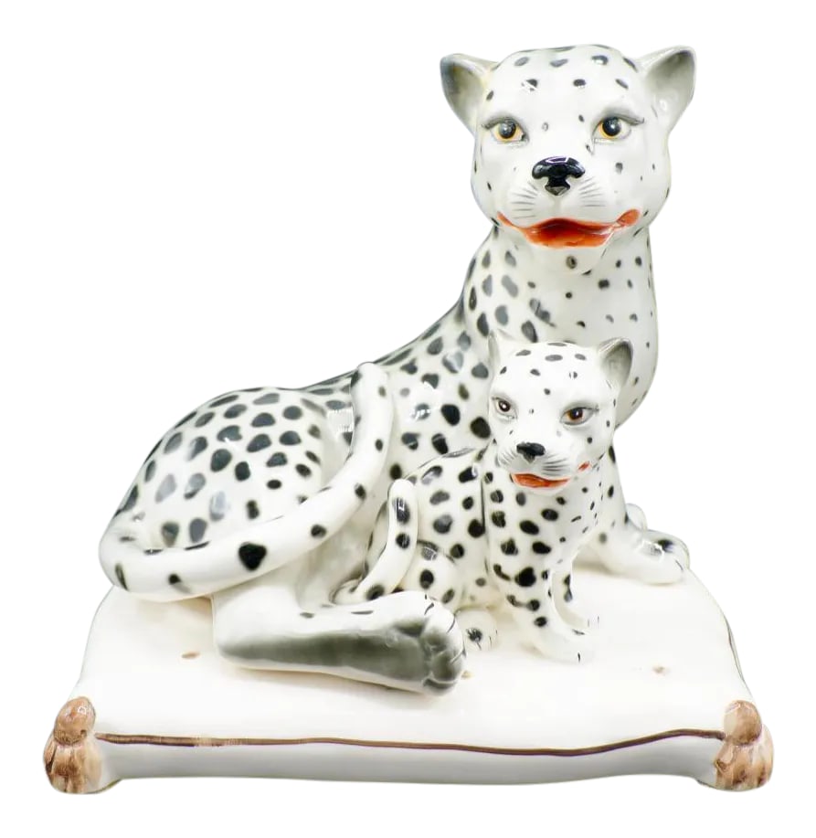 Italian Hand-Painted Snow Leopards: Stunning Italian porcelain snow leopards in excellent condition. Beautifully hand-crafted and painted, this piece makes a statement in modern or contemporary settings alike. Marked "Italy"