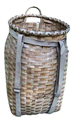 Tall Vintage Creel or Fisherman's Woven Wicker Basket With Canvas Straps: A creel was known to be a wicker basket usually used for carrying fish or blocks of peat. Due to its size, it may have also been used for lobster and other crustaceans. The canvas straps are still