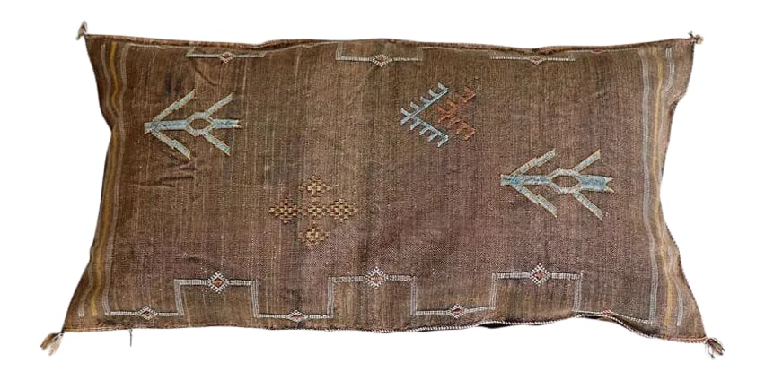 Moroccan Sabra Pillow - Brown: Our Moroccan Sabra Pillows are perfect for adding a refined boho vibe to any space. Each Pillow is detailed with handwork of Moroccan textiles originally as rugs but turned into pillows. Hand-loomed i