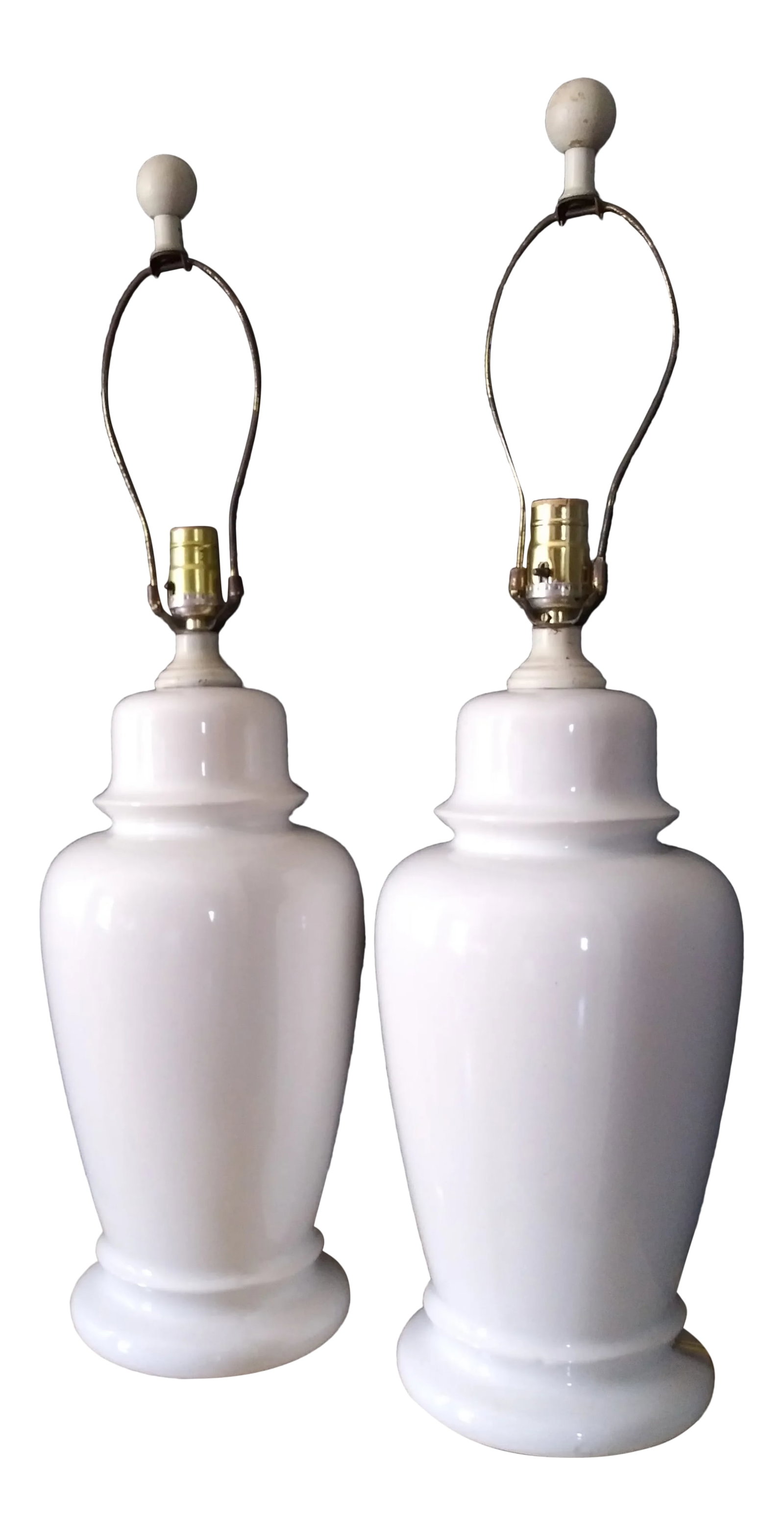 Vintage White Ceramic Lamps - a Pair: This beautiful lamps are the 60s-70s era. They are made of ceramic on a white color finish. They have the original hardware and they are in perfect functional condition. 29" tall and 9" wide. Conditio