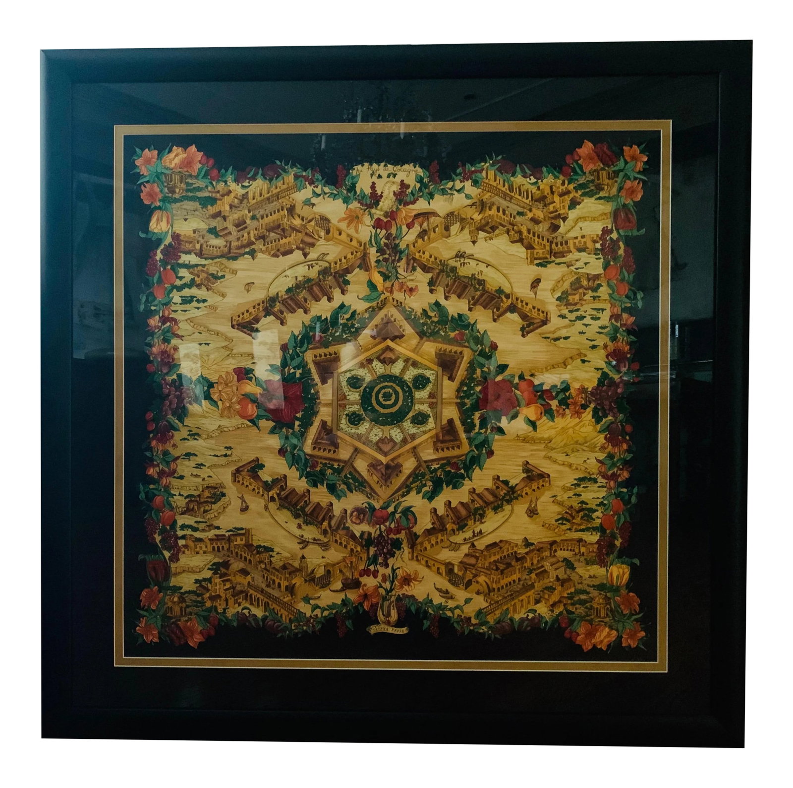 Vintage Hermes Au Pays De Cocagne Framed Scarf: This elegant Hermes "Au Pays de Cocagne" silk scarf is mounted in a black painted frame with black and gold matting. The scarf was designed by Zoe Pauwels, who has created over 20 iconic scarf