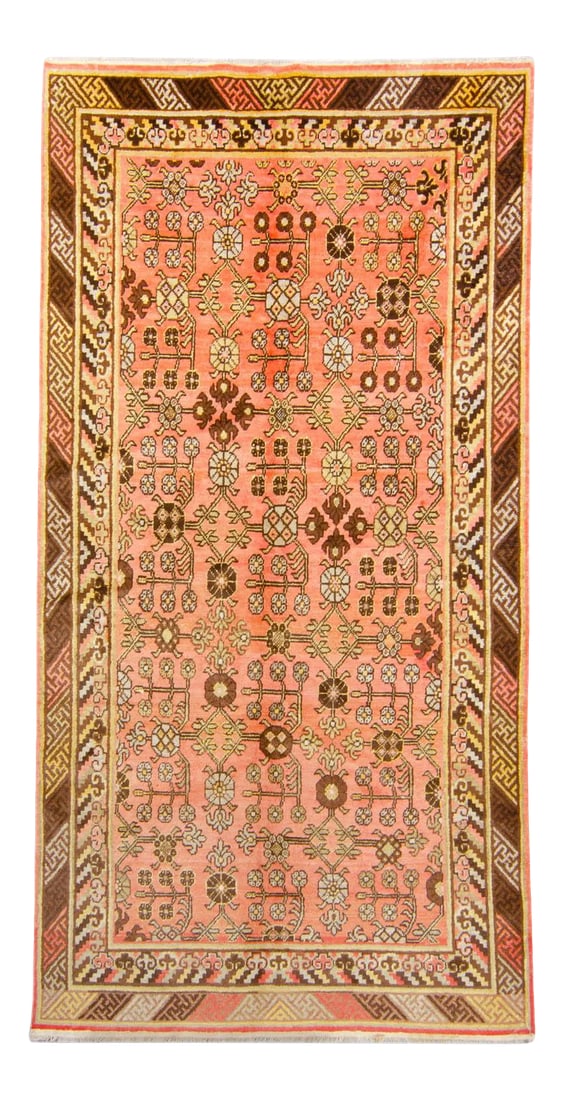 1920s Antique Khotan Art Deco Salmon Brown Wool Hand-Knotted Rug - 4'6" X 8'8": This antique hand-knotted Asian Khotan rug has a beautiful floral pattern inside a contrasting border design. Featuring a warm mixture of colors such as salmon for the base and accents of sage, mustar
