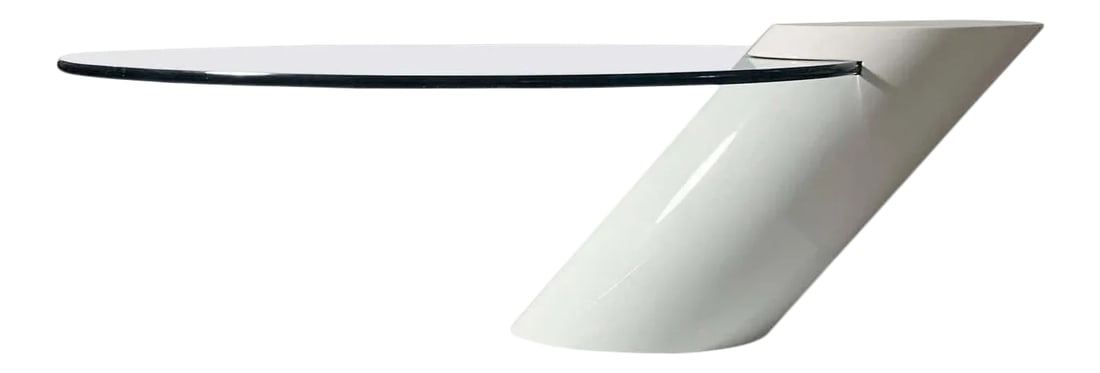 Cantilevered Glass White " Zephyr" Cocktail Table by Wade Beam for Brueton: Oval glass set into a lacquered angled Wood base. Designed by J. Wade Beam for Brueton. Condition: Alterations: Unknown Imperfections: Some Imperfections Condition Notes: Good Origin: United States
