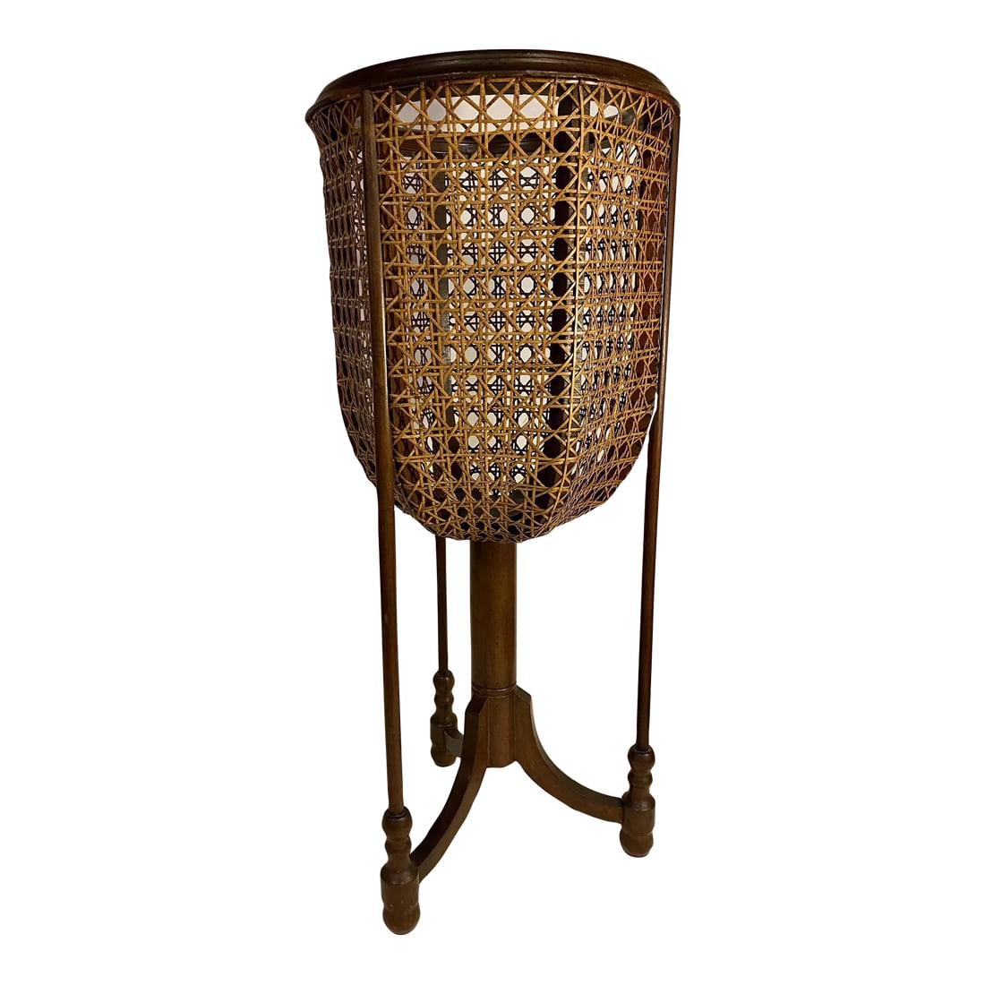 1960s Boho Wood and Wicker Plant Stand: Vintage boho wood and wicker basket plant stand. Features round wicker cane basket with wooden tripod stand and bentwood rim. Fits a 10" pot. Condition: Alterations: Original Condition Unaltered
