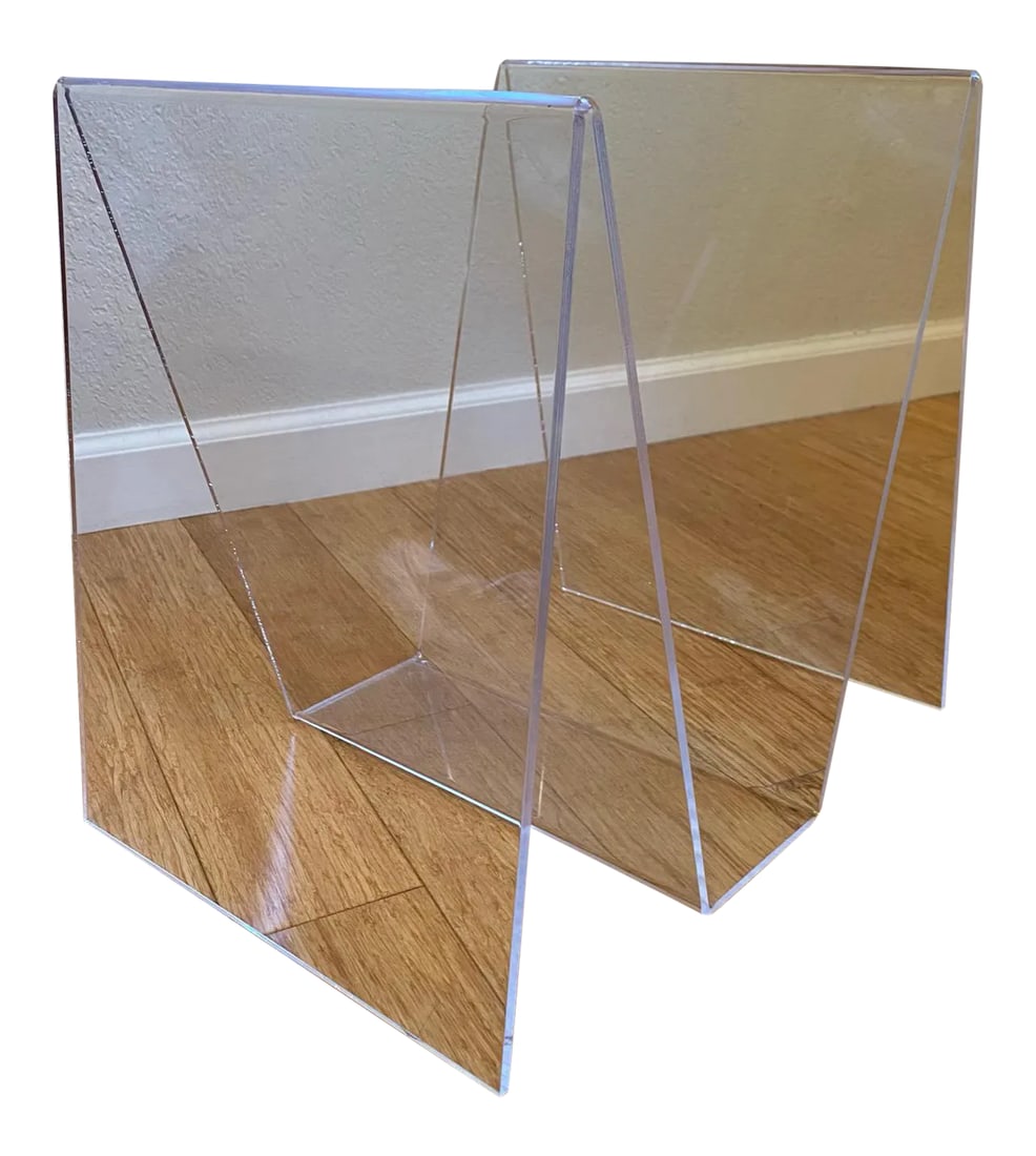 Mid Century Modern Bent Lucite Magazine Rack: This vintage lucite magazine rack from the 70s is a mid century modern classic that is ready to hold everything from your light reading materials to your vinyl records. The solid piece of sturdy
