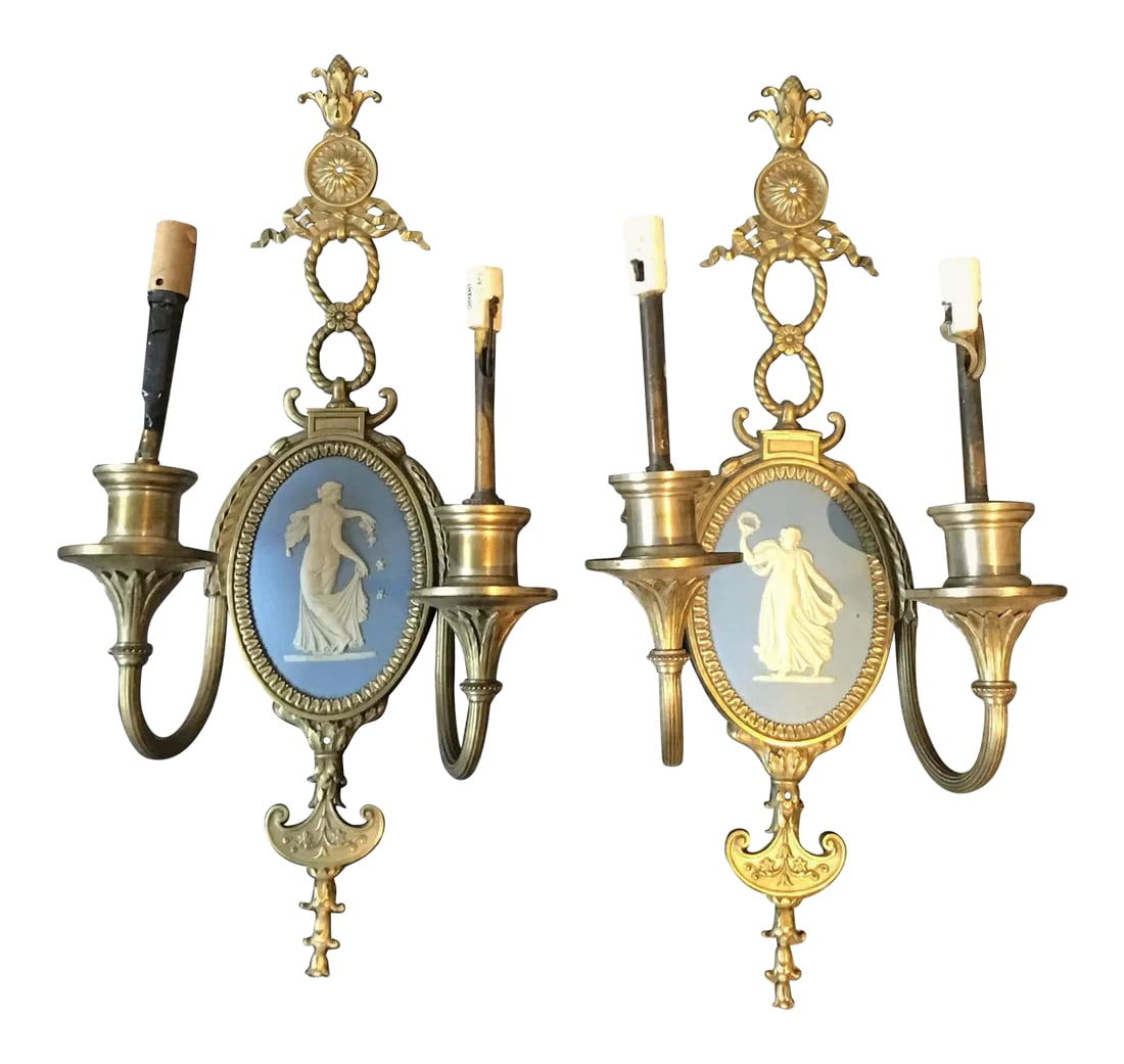 1940s Wedgwood Sconces - A Pair: 1940s Wedgwood sconces. Silver plate sconces with a brass finish. In places where the brass was polished away, silver plate shows through. Condition: Alterations: Unknown Imperfections: Some
