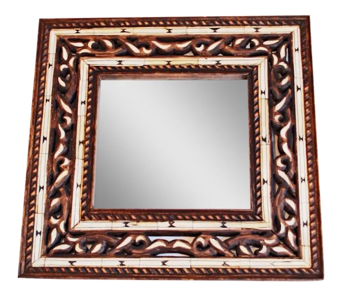 Moroccan Bone Inlaid Mirror: This masterpiece is handcrafted by skillful artisans in Marrakech. All-over inlaid with intricate bone designs, this magnificent mirror will add an authentic Oriental accent to you home decor.