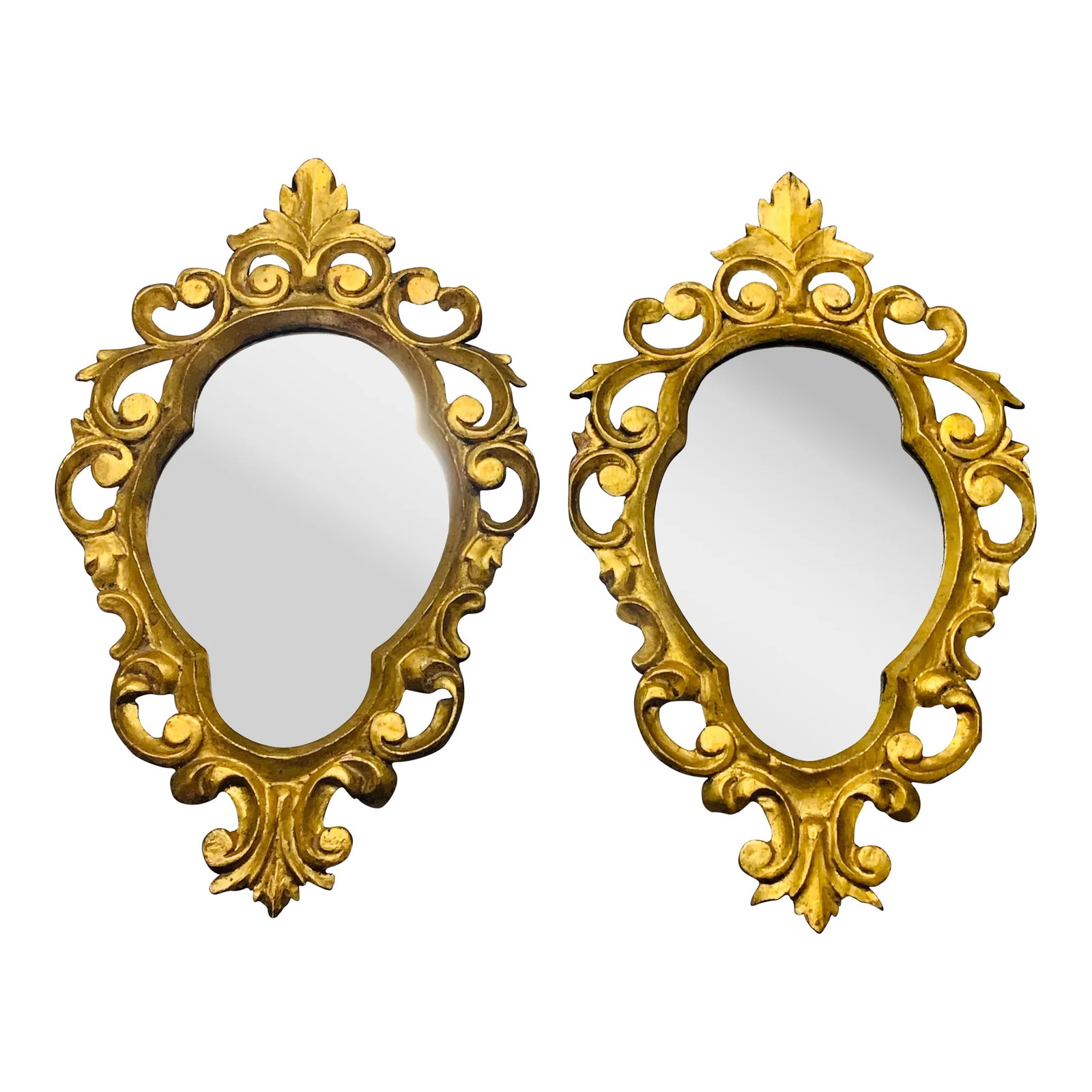 Italian Gilt Wood Mirrors - a Pair: Pair of beautiful vintage Italian gilt wood mirrors. Ready to hang! Unmarked. Each measures roughly 12.25" wide x 20.25" high x 1.25" deep. Condition: Alterations: Original Condition Unaltered
