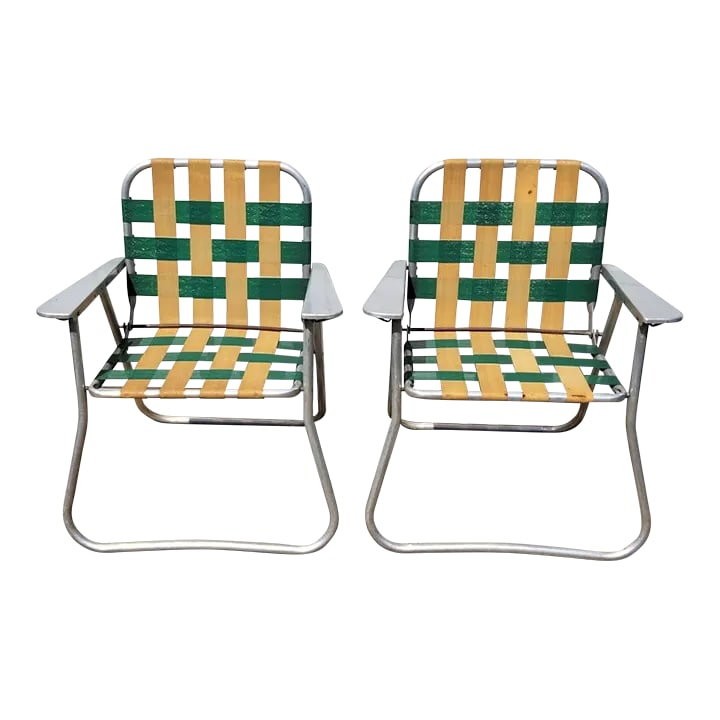 1950's Aluminum and Nylon Folding Lawn Chairs - a Pair: These vintage lawn chairs bring back happy memories of summer afternoons spent in my grandmother's backyard. Chairs such as these were very popular back in the day, and because they were made of