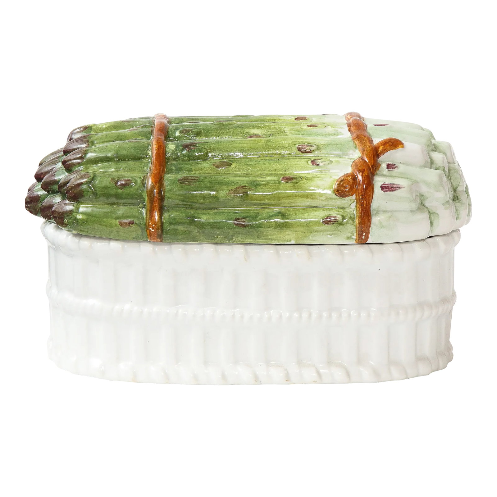 An Italian 'Asparagus' Basket-Form Ceramic Tureen: The cover modeled as a bundle of tied asparagus, set on a white basket-form base. Signed on bottom: Meiselman 8409-Made in Italy From the Collection of Mario Buatta, New York, NY Condition: