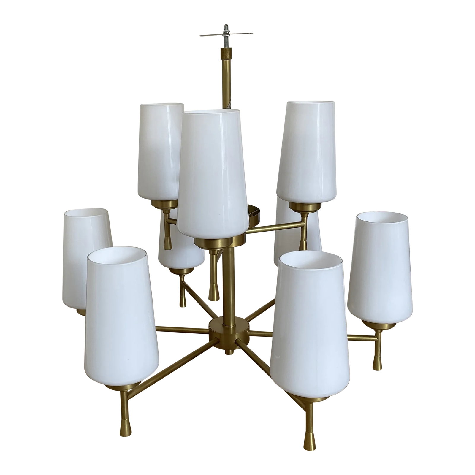 Brass Chandelier With Glass Shades: Arteriors Sigmund 9 Light 28" Wide Chandelier Sleek and modern The Sigmund chandelier slender profile is composed of solid steel which has been finished in Antique Brass. Milk glass shades. A focal