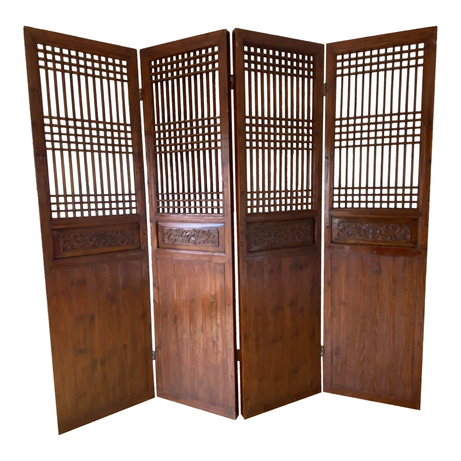 Chinese Antique Four-Panel Wooden Screen: Four-paneled antique wooden screen of pine and elm wood, dating back to mid-19th century China. Originally used as doors. Top panel has lattice work, the middle section has carved dragons, and the bot