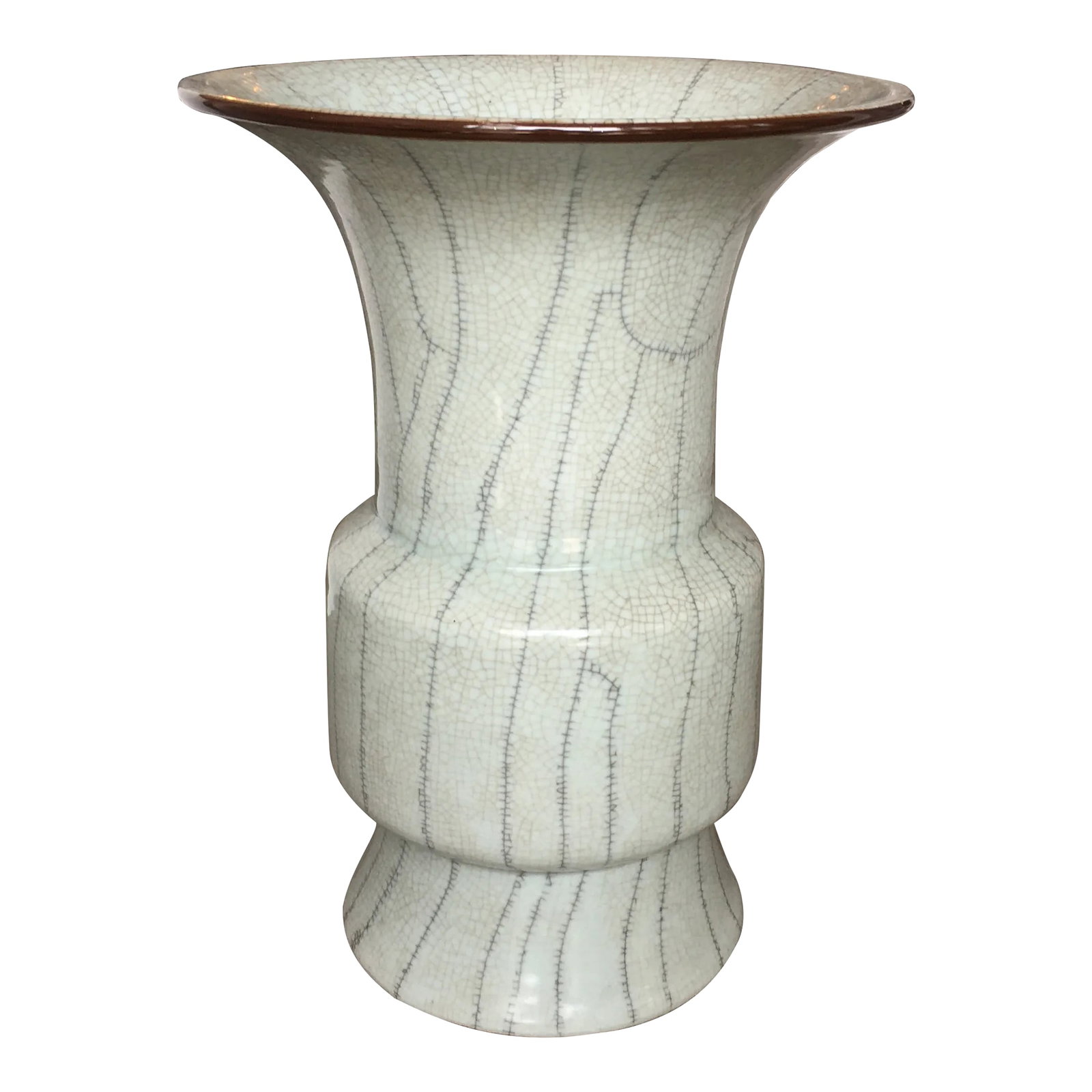 Crackle Ceramic Umbrella Stand: Pale green crackle ceramic umbrella stand. In addition to the overall crackle effect it has long crackle lines giving it this aged look. Solid and sturdy it stands 20 inches tall with a circumference 
