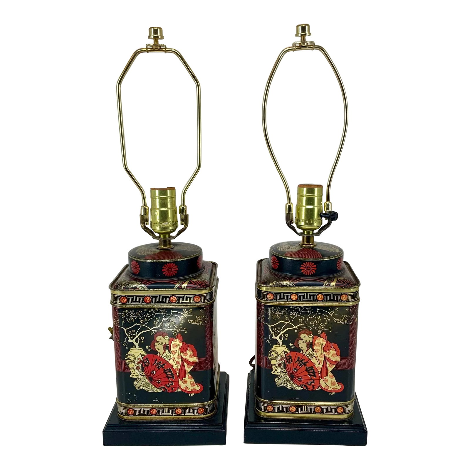 Pair of Vintage English Tole Tea Caddy Chinoiserie Table Lamps: Beautiful pair of vintage tole tea caddy table lamps. Gold and red on black background . Decorated with Japanese geisha scenes. Containers made in England by Hudson Scott & sons LTD of Carlisle. Black