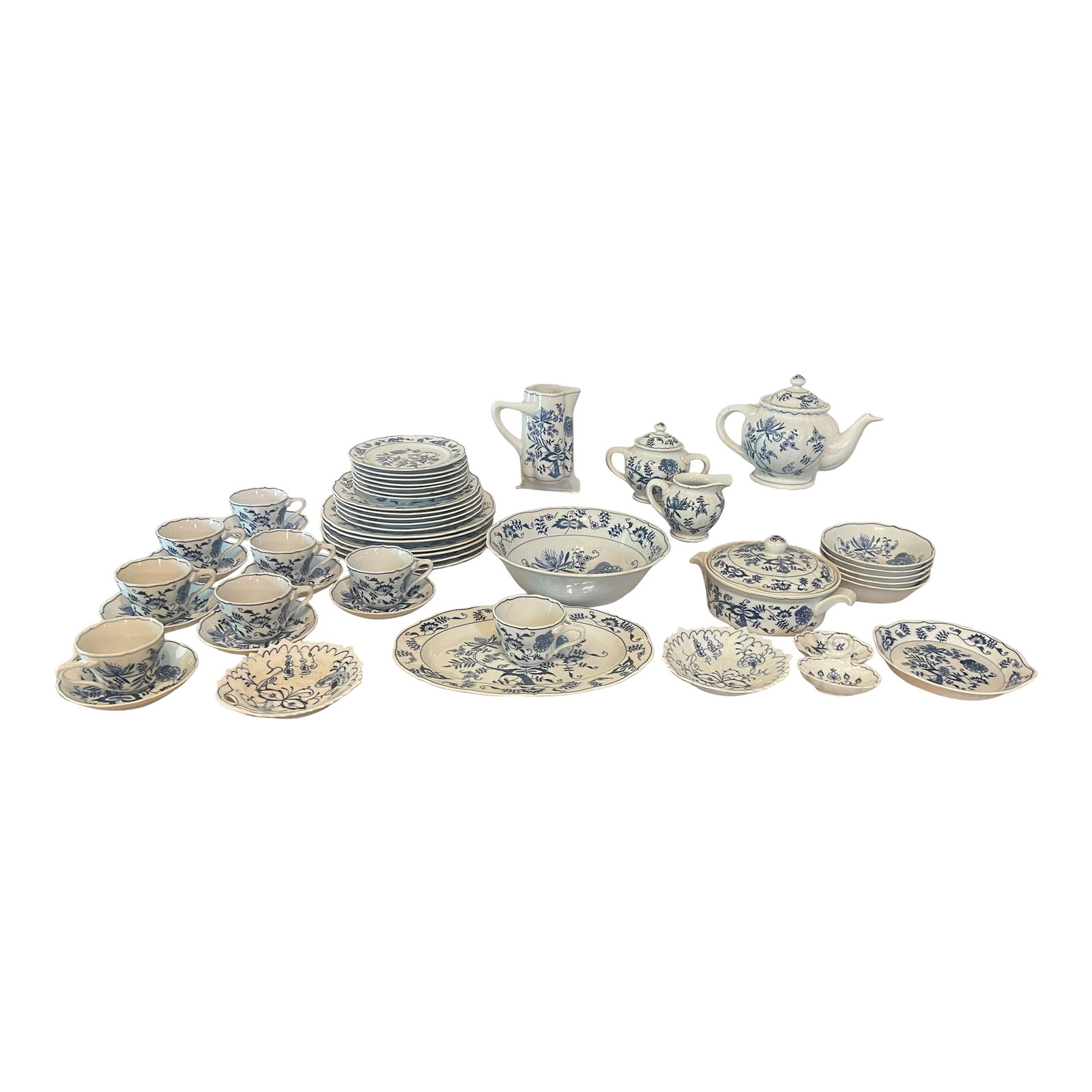 Vintage Blue Danube Onion Dinnerware Set- 53 Pieces: From a prestigious Estate in Gold Coast Florida. This vintage Blue Danube Japan 53 piece set is a beautiful addition to any kitchen or collection. The blue onion pattern on the porcelain material is a