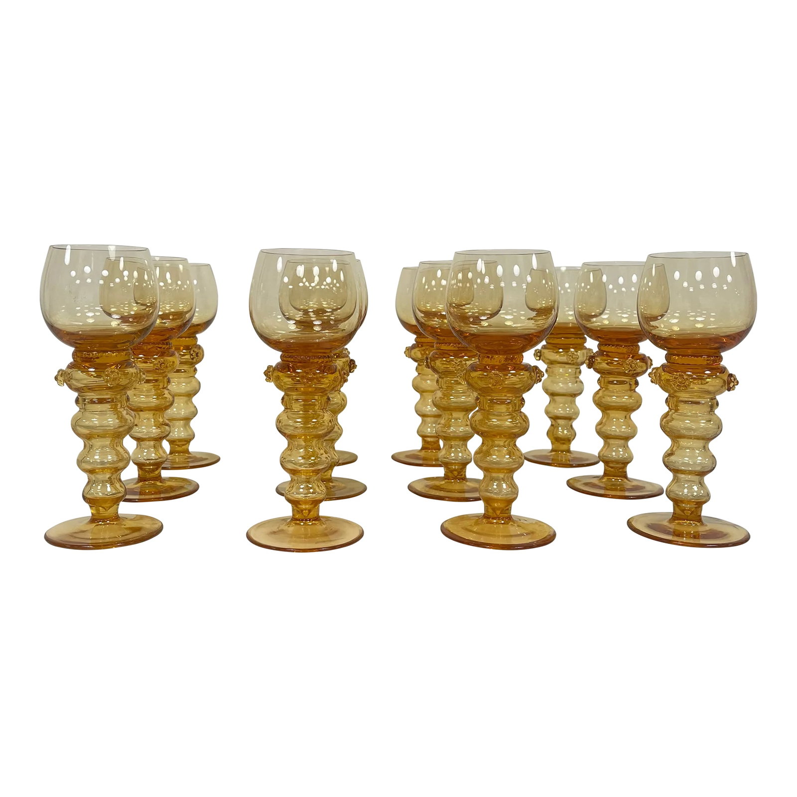 Mid 19th Century Gold/Amber Bohemian Goblets- Set of 12: A collection of twelve Bohemian goblets, resplendent in gold and warm amber hues. This set set captures the essence of Bohemian beauty and captures the eye of anyone looking for something extraordinar